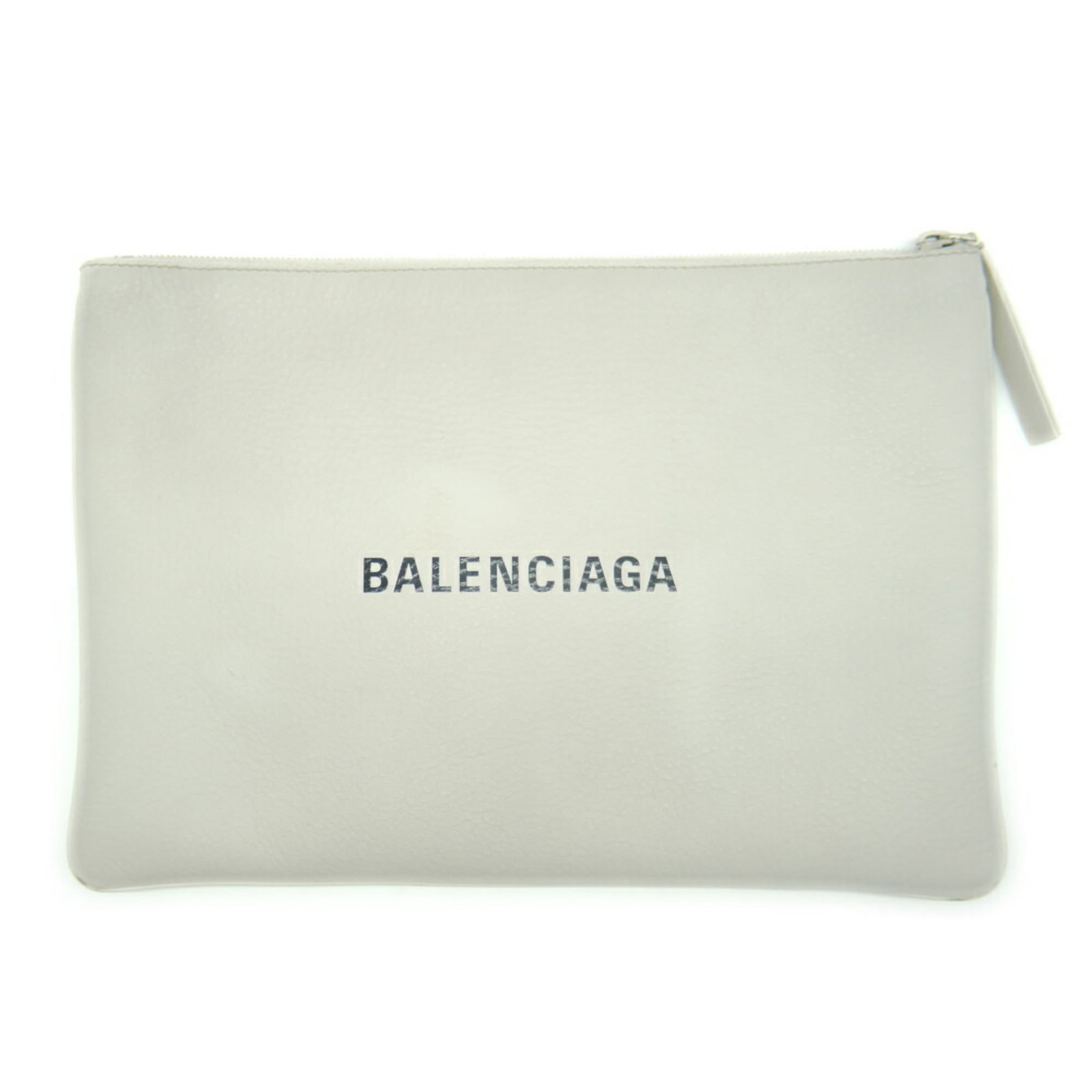 Leather Clutch Bag by Balenciaga: Leather Clutch Bag by Balenciaga White leather clutch bag from Balenciaga, measuring 23cm x 33cm x 1cm. Comes with dust bag for added protection. A sleek and stylish accessory for everyday use. Item