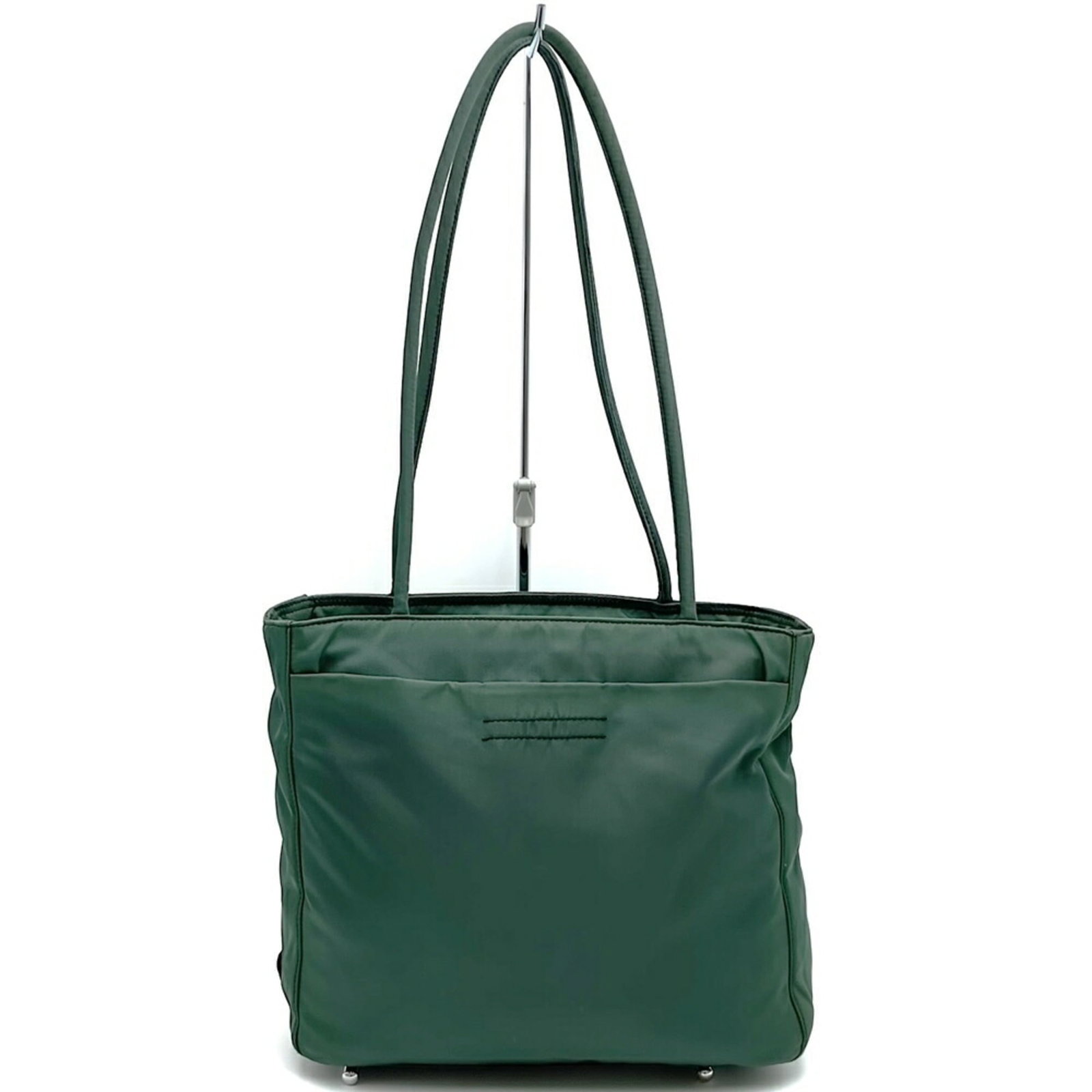 Prada Shoulder Bag Tote Bag Nylon: Prada Shoulder Bag Tote Bag Nylon Prada's nylon tote bag boasts a sleek, modern design with a vibrant green hue. Measuring 21cm x 24cm x 9cm, it offers ample space for daily essentials. Crafted from