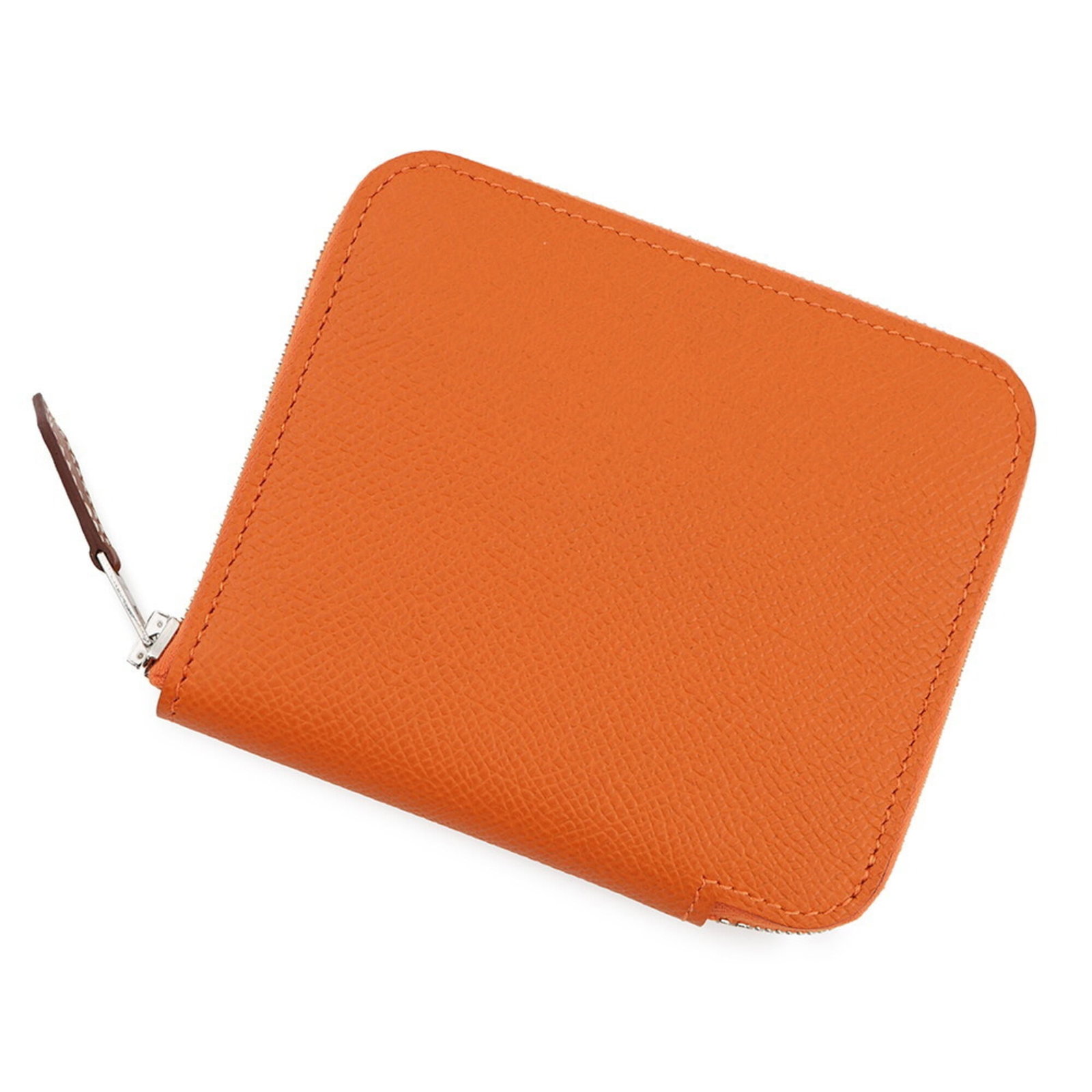 Hermes Coin Purse/ Coin Case Epsom Leather: Hermes Coin Purse/ Coin Case Epsom Leather Epsom leather coin purse from Herm?s, crafted in France. This vibrant orange coin case measures 9.5cm x 11cm and features the iconic Epsom leather material. 