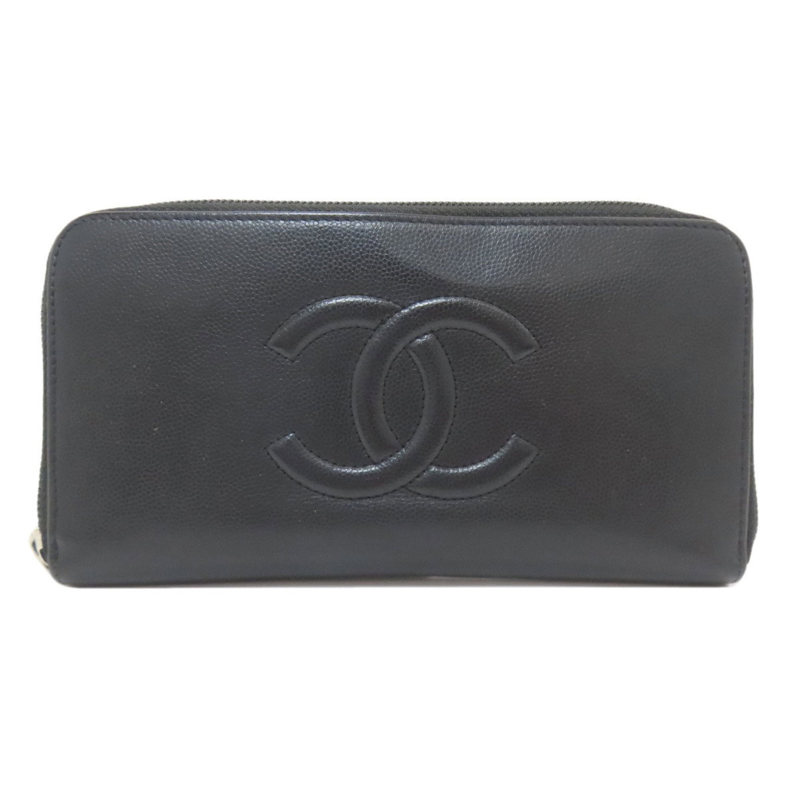 Calfskin long bi-fold wallet from Chanel: Calfskin long bi-fold wallet from Chanel Calfskin long bi-fold wallet from Chanel boasts sleek black design, precision-cut to fit perfectly in your hand. Made from high-quality grained Calfskin, its