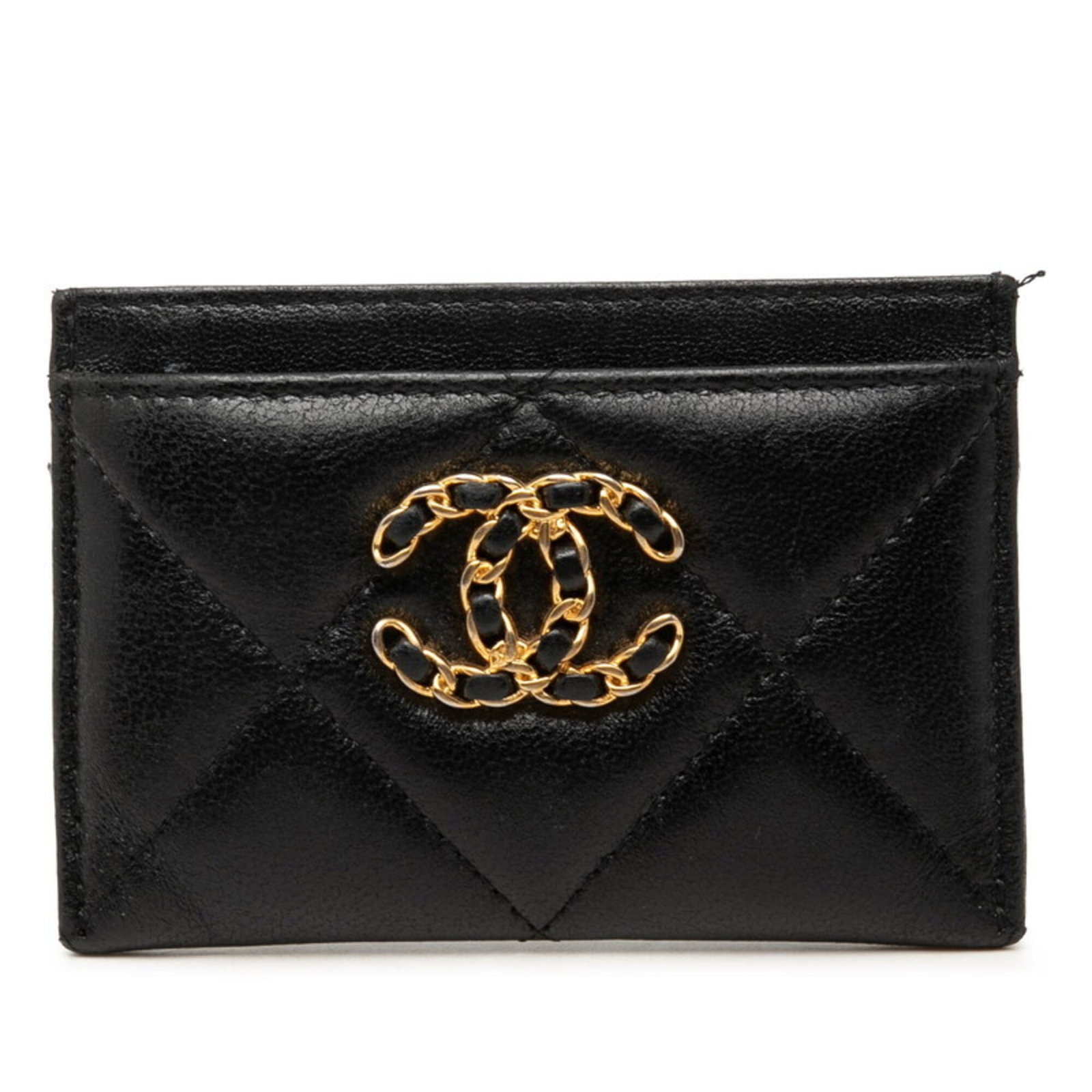 Card Case Leather by Chanel: Card Case Leather by Chanel The Card Case Leather by Chanel features sleek, black lambskin construction with precise dimensions, measuring 7.5cm x 11cm x 1cm. Made from high-quality leather, this