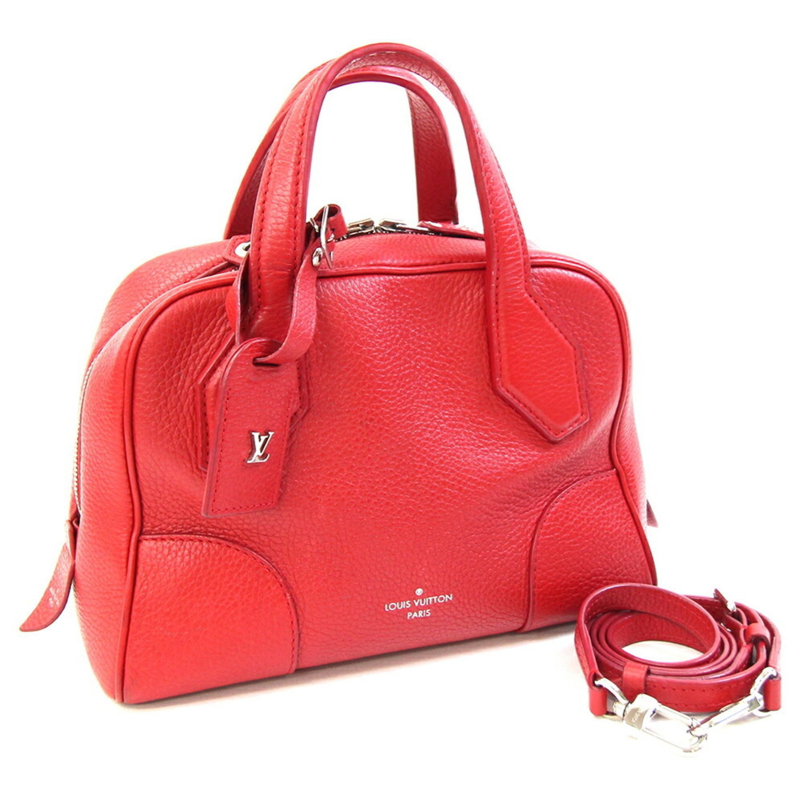 Louis Vuitton Handbag Leather: Louis Vuitton Handbag Leather Cerise, Red color Louis Vuitton Handbag Leather features Taurillon leather construction. The bag measures 18cm x 25.5cm x 11cm and has a strap length of 98cm - 108cm.