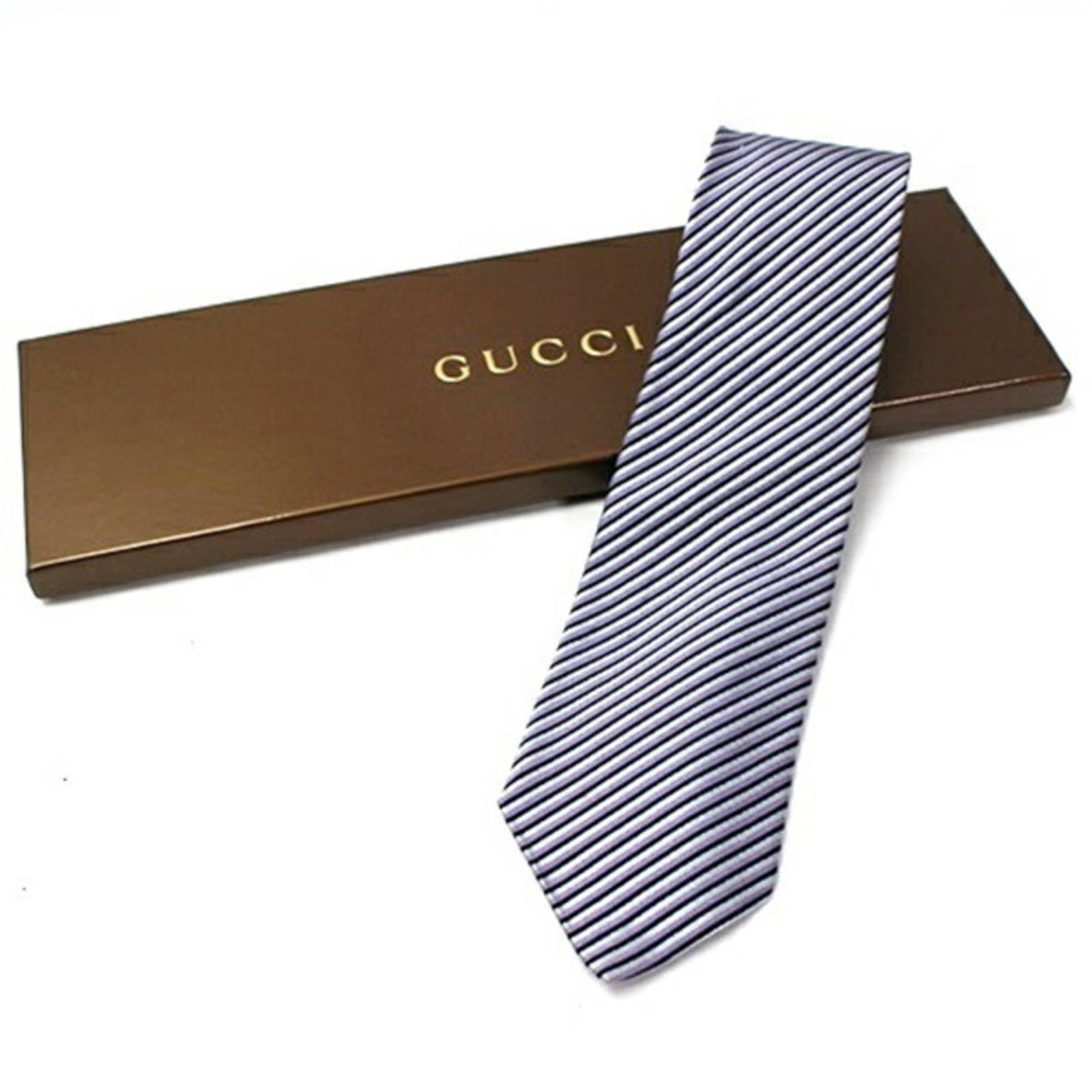 Cotton silk cravat Gucci: Cotton silk cravat Gucci Cotton silk cravat from Gucci, available in black, gray, and purple. This stylish accessory features a unique blend of materials and a slim width of 9cm, making it perfect