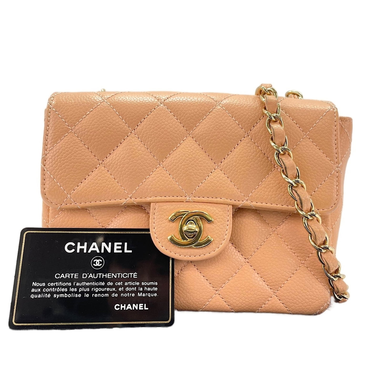 Shoulder Bag by Chanel: Shoulder Bag by Chanel The iconic Chanel shoulder bag boasts a vibrant orange hue and sleek design, featuring a signature flap closure. Measuring 13cm x 17cm x 6cm, this stylish accessory exudes