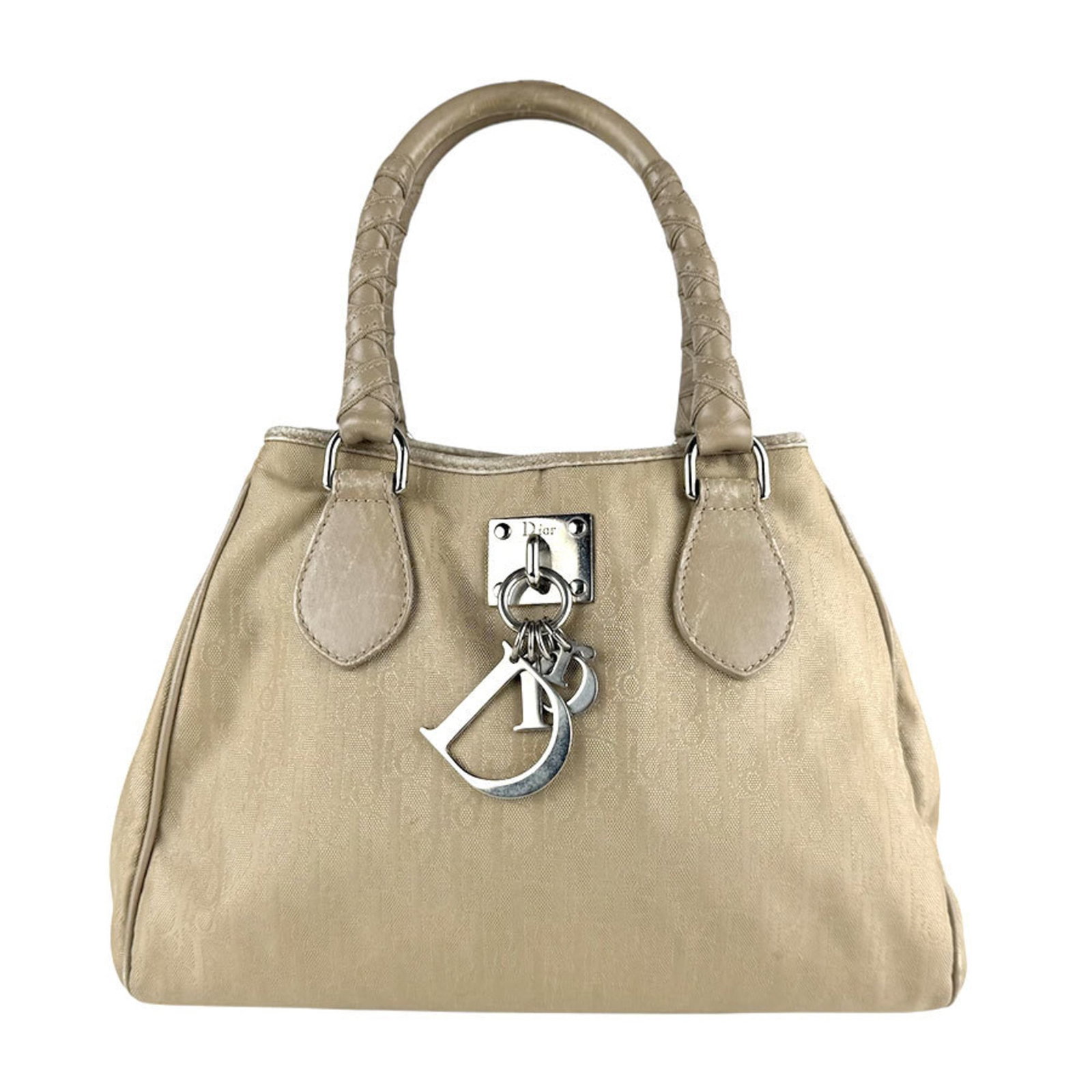 Christian Dior Handbag Nylon Canvas: Christian Dior Handbag Nylon Canvas Christian Dior's iconic nylon canvas handbag boasts a timeless beige hue and sleek design, measuring 20cm x 27cm x 11cm. Made from high-quality nylon canvas, this