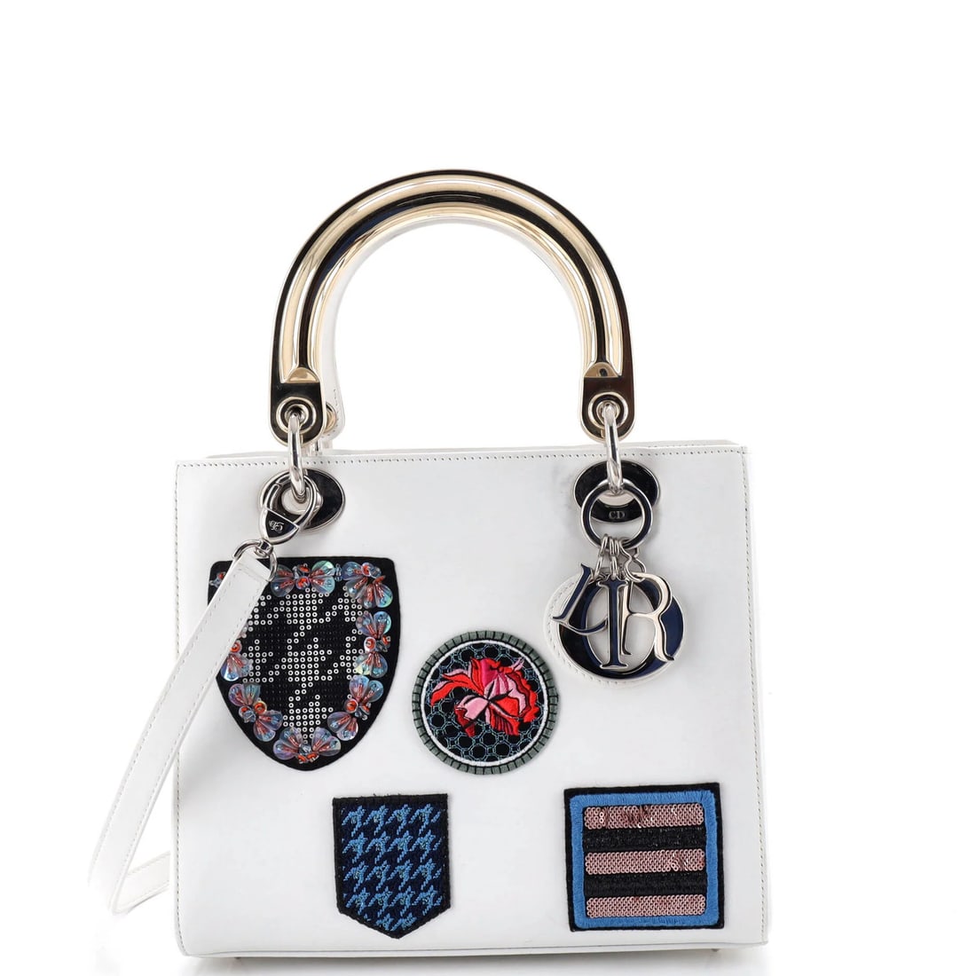 Christian Dior Lady Dior Bag Leather Medium Patch Embellished: Christian Dior Lady Dior Bag Leather Medium Patch Embellished The Christian Dior Lady Dior Bag Leather Medium Patch Embellished boasts a sleek, white leather exterior with gold tone hardware. This