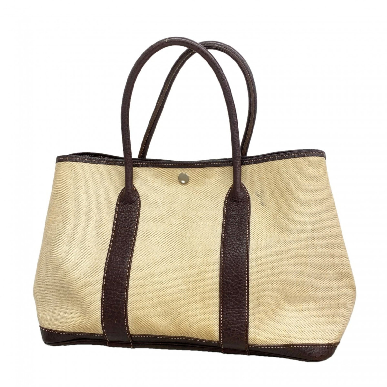 Hermes Tote Bag Toile H: Hermes Tote Bag Toile H Toile H tote bag from renowned luxury brand Hermes, crafted with high-quality materials and boasting classic design elements. This timeless piece features silver hardware and