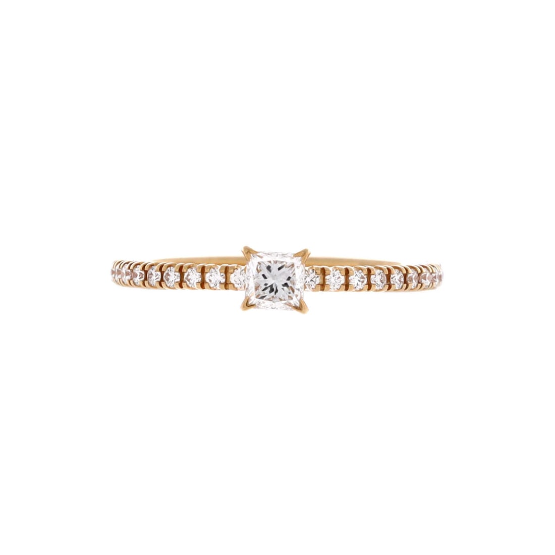 Cartier Ring 18k yellow gold with princess cut diamond: Cartier Ring 18k yellow gold with princess cut diamond 18k yellow gold Cartier ring features a princess cut diamond and pave diamonds, showcasing the luxury of 18K metalwork. The ring's classic style