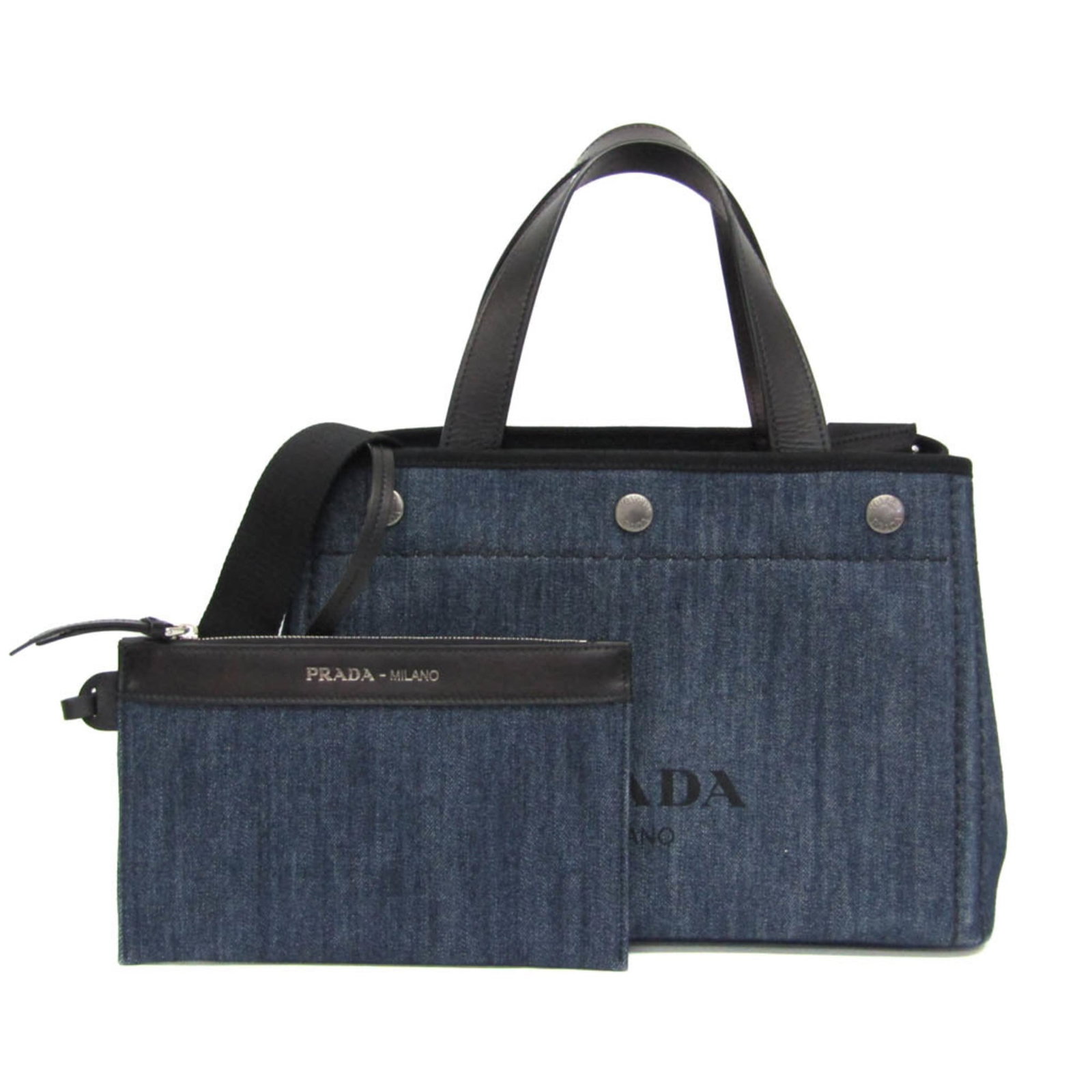 Denim Leather Prada Bag Tote Shoulder: Denim Leather Prada Bag Tote Shoulder Denim City Calf Tote from Prada features a unique blend of denim and leather, with an open top closure and two pockets for organization. The bag's spacious