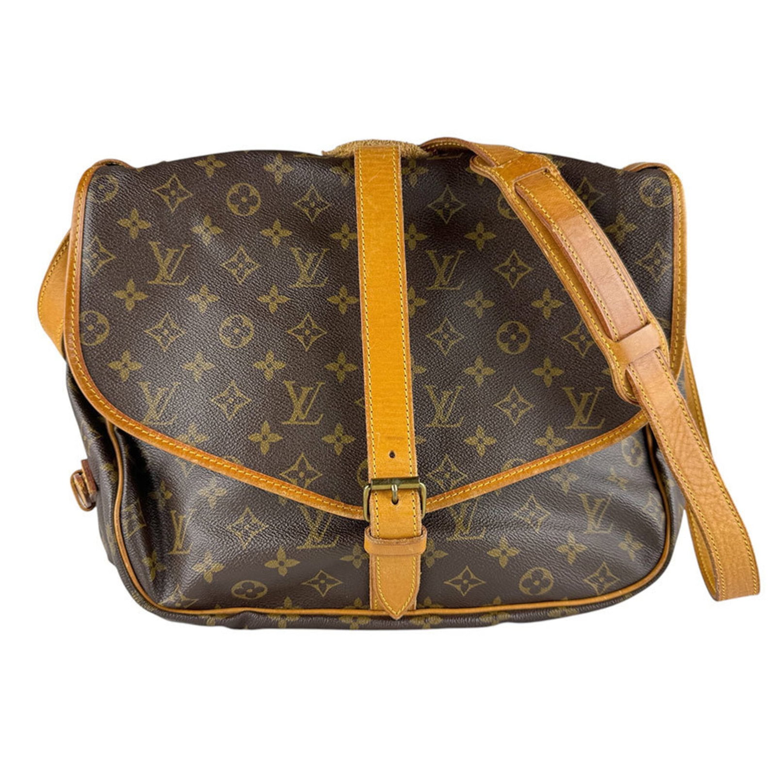Shoulder Bag Monogram By Louis Vuitton: Shoulder Bag Monogram By Louis Vuitton Monogrammed with iconic Louis Vuitton design, this brown shoulder bag boasts the brand's signature monogram pattern. Made from high-quality materials, its