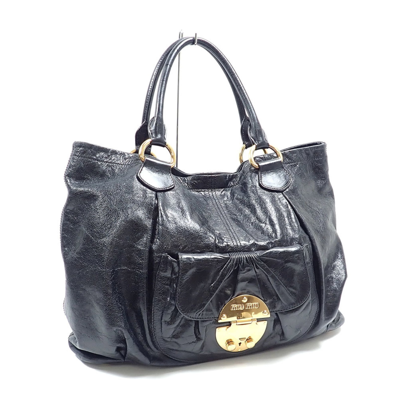 Miu Tote Bag Leather: Miu Tote Bag Leather Black leather Miu Miu tote bag with dimensions 30cm x 40cm x 13cm. This stylish bag features high-quality leather construction and a classic design that suits everyday use. The si