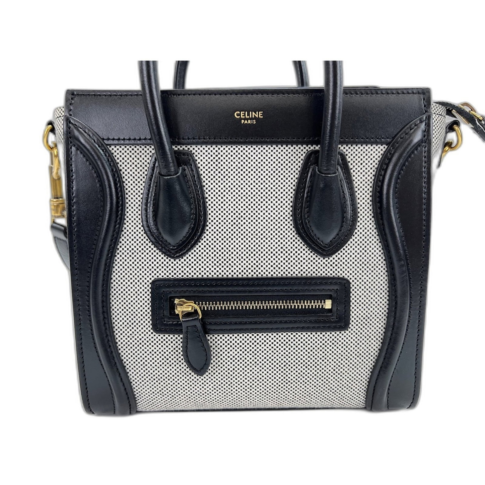 Shoulder Bag by Celine: Shoulder Bag by Celine Black Celine shoulder bag with clean lines and compact dimensions, measuring 20cm x 20cm x 7cm. The sleek design makes it a versatile accessory for everyday use. Its classic