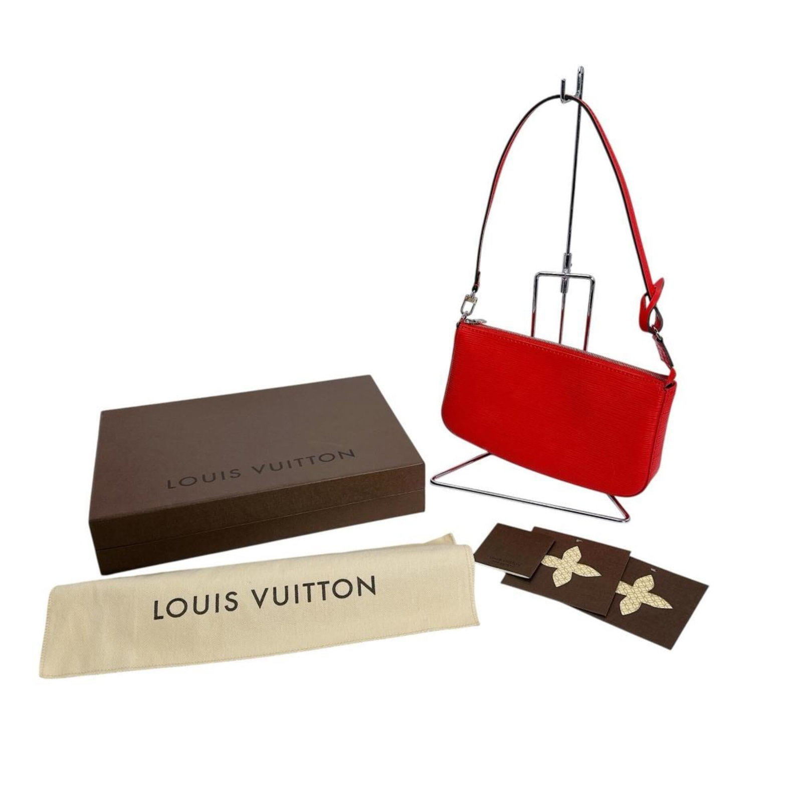 Epi Leather Pochette Pouch Louis Vuitton: Epi Leather Pochette Pouch Louis Vuitton Epi leather pouch with classic Louis Vuitton design, featuring a bold red color. Made from high-quality Epi leather, this pochette measures 13.5cm x 23cm x
