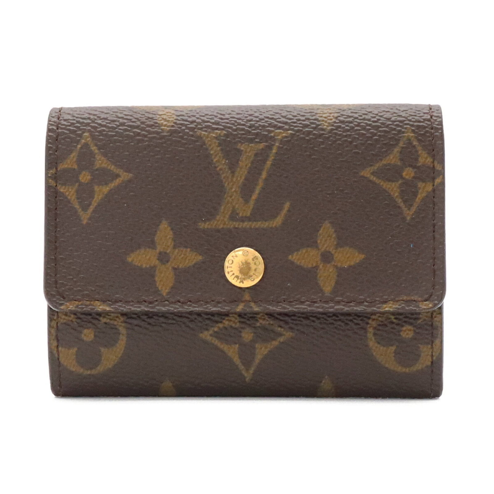 Louis Vuitton Monogram Canvas Coin Case: Louis Vuitton Monogram Canvas Coin Case The Louis Vuitton Monogram Canvas Coin Case boasts a timeless design, featuring the iconic monogram pattern in rich brown canvas. With its compact size and slee