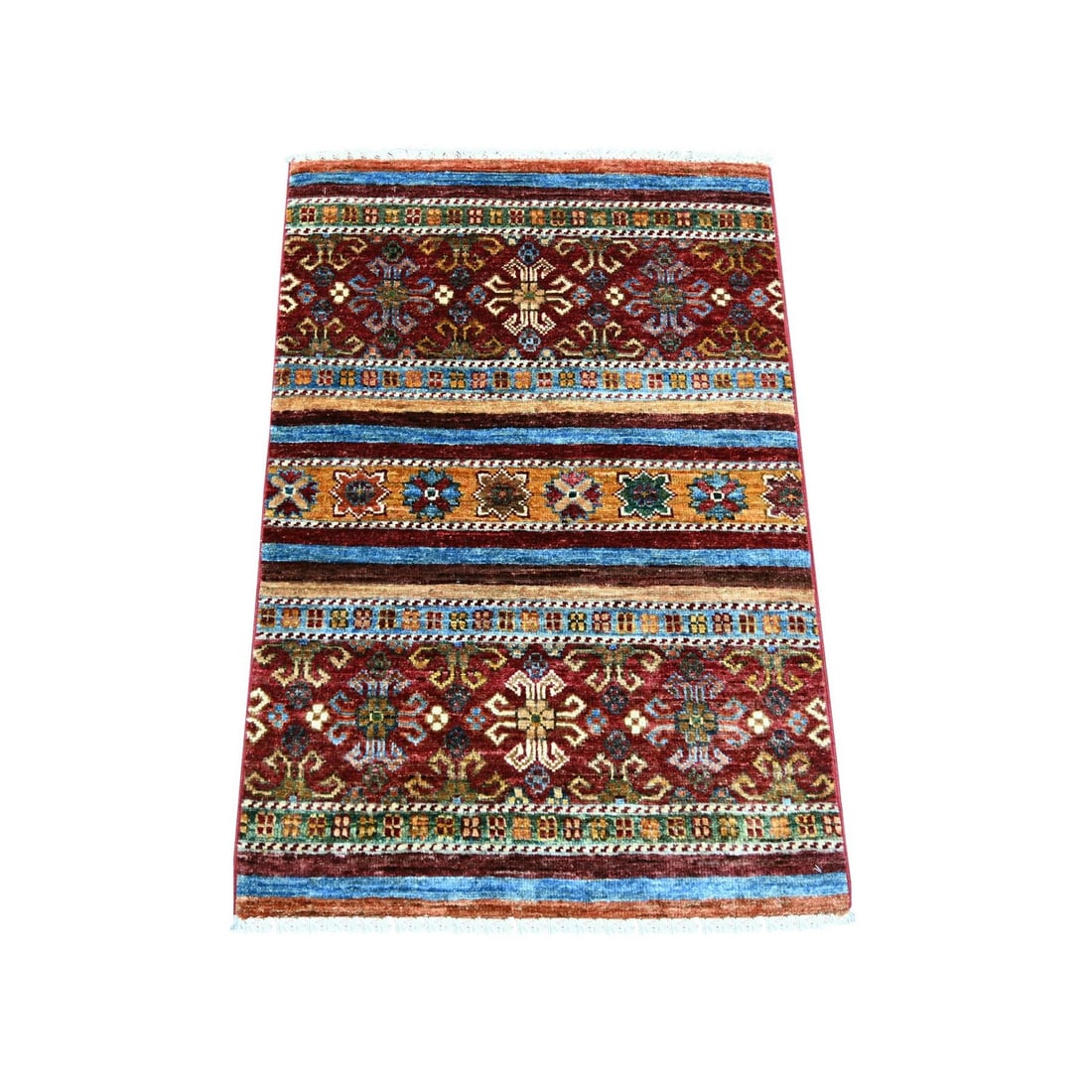 2'1"x3'1" Colorful Afghan Super Kazak Khorjin Design Hand Knotted Wool Rug: 2'1"x3'1" Colorful Afghan Super Kazak Khorjin Design Hand Knotted Wool Rug The vibrant multicolored design of this hand-knotted wool rug, measuring 2'1" x 3'1", showcases the rich cultural heritage of