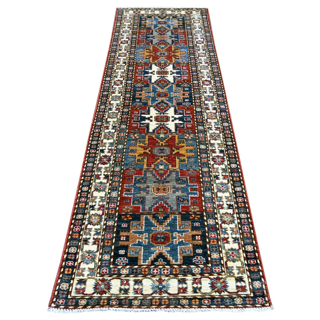 2'10"x9' Colorful Afghan Super Kazak Hand Knotted Wool Runner Rug: 2'10"x9' Colorful Afghan Super Kazak Hand Knotted Wool Runner Rug Colorful Afghan Super Kazak Hand Knotted Wool Runner Rug boasts an all-over regional design in vibrant multicolored hues, set against 