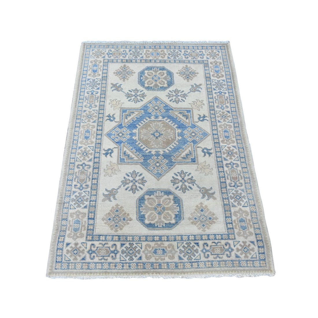 3'3"x4'7" Ivory Vintage Look Kazak Medallion Design Wool Hand Knotted Rug: 3'3"x4'7" Ivory Vintage Look Kazak Medallion Design Wool Hand Knotted Rug This stunning Kazak-style wool hand-knotted rug boasts an intricate medallion design in rich ivory hues, adding a touch of ele