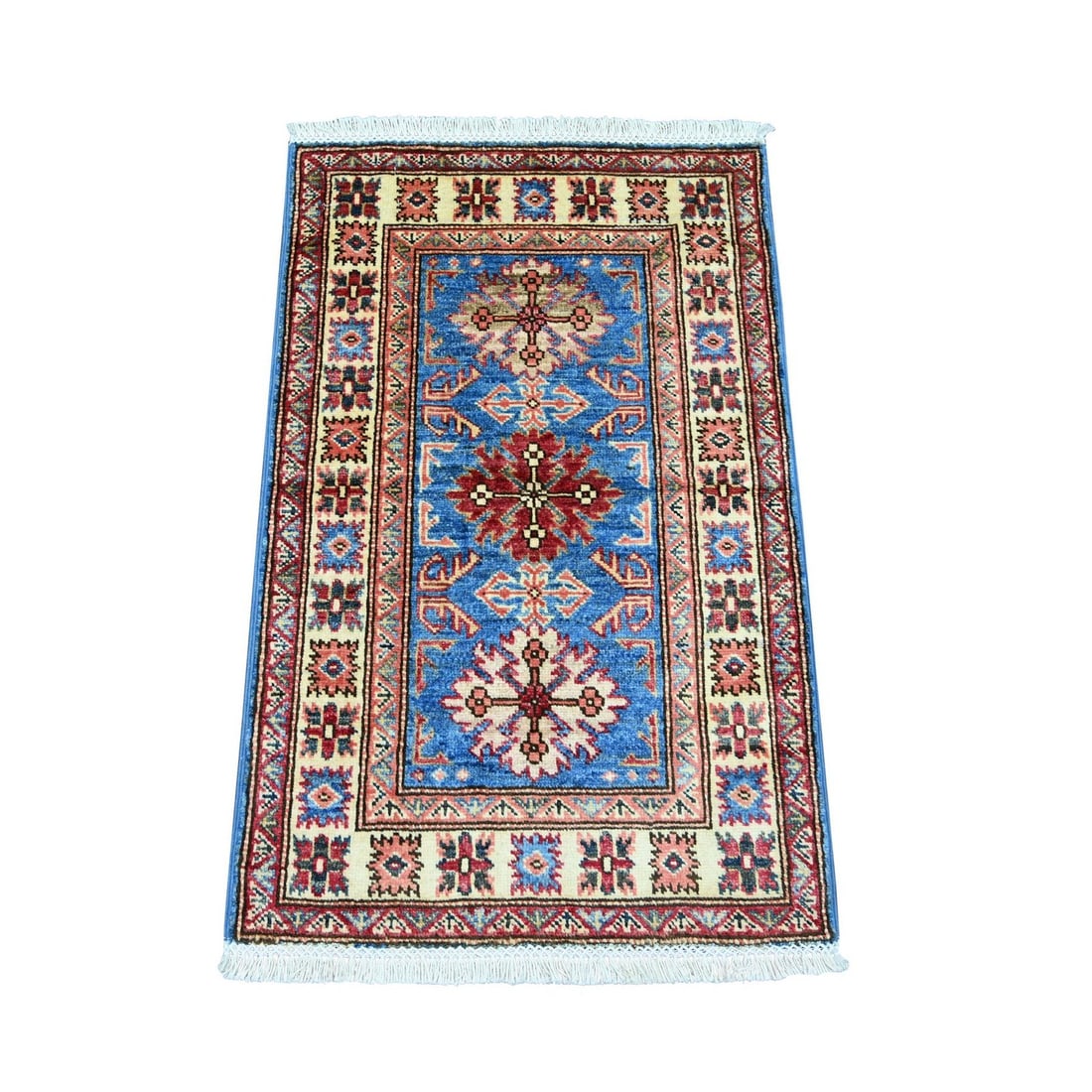 2'x3' Blue Afghan Super Kazak Hand Knotted Pure Wool Sample Mat Rug: 2'x3' Blue Afghan Super Kazak Hand Knotted Pure Wool Sample Mat Rug The Blue Afghan Super Kazak Hand Knotted Pure Wool Sample Mat Rug boasts an all-over regional design in vibrant blue hues, intricate