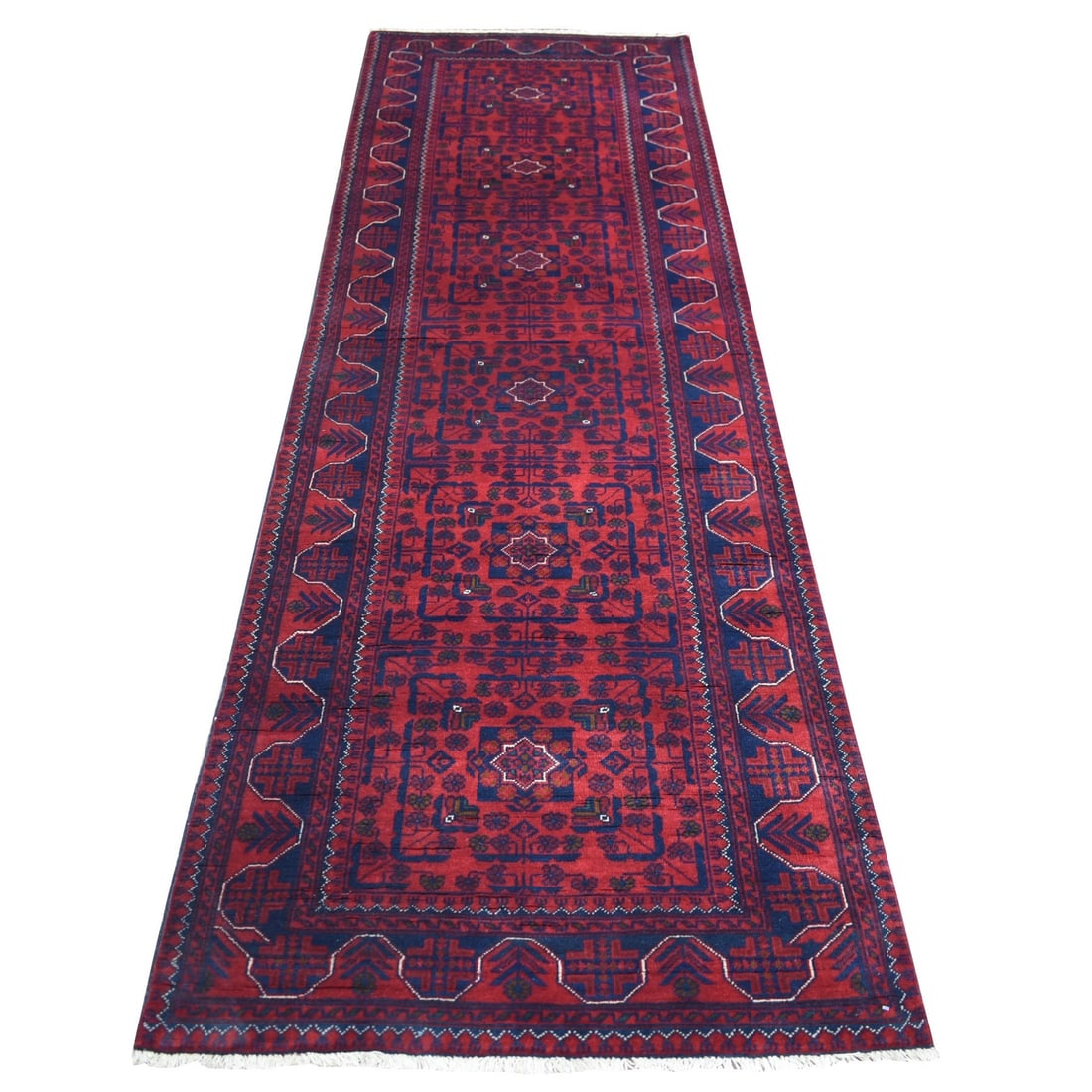 2'10"x9'4" Red Tribal Design Hand Knotted Afghan Khamyab Wool Runner Rug: 2'10"x9'4" Red Tribal Design Hand Knotted Afghan Khamyab Wool Runner Rug The vibrant red tribal design hand-knotted Afghan wool runner rug boasts an impressive 9'4" length, making it a stunning center