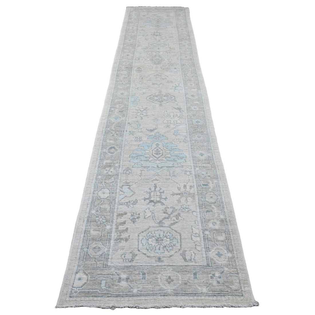 2'10"x13'7" White Angora Oushak Leaf Design Hand Knotted Wool Runner Rug: 2'10"x13'7" White Angora Oushak Leaf Design Hand Knotted Wool Runner Rug This stunning hand-knotted wool runner rug boasts an intricate leaf design in a beautiful ivory color, set against a subtle gra