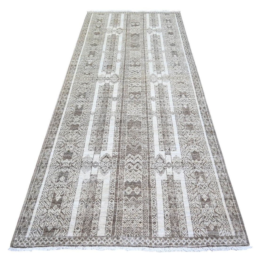 4'1"x9'8" Taupe Brown Wool Hand Knotted Finer Peshawar Oriental Rug: 4'1"x9'8" Taupe Brown Wool Hand Knotted Finer Peshawar Oriental Rug This stunning 4'1"x9'8" Peshawar Oriental rug boasts a rich, taupe brown hue and intricate hand-knotted wool design. Handcrafted in 