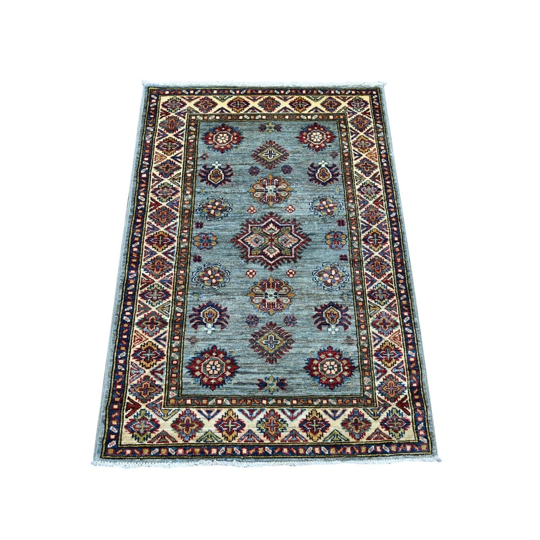 2'8"x3'9" Gray Super Kazak Medallions Design Hand Knotted Wool Mat Rug: 2'8"x3'9" Gray Super Kazak Medallions Design Hand Knotted Wool Mat Rug The 2'8"x3'9" Gray Super Kazak Medallions Design Hand Knotted Wool Mat Rug boasts a stunning medallion pattern in soothing grey h
