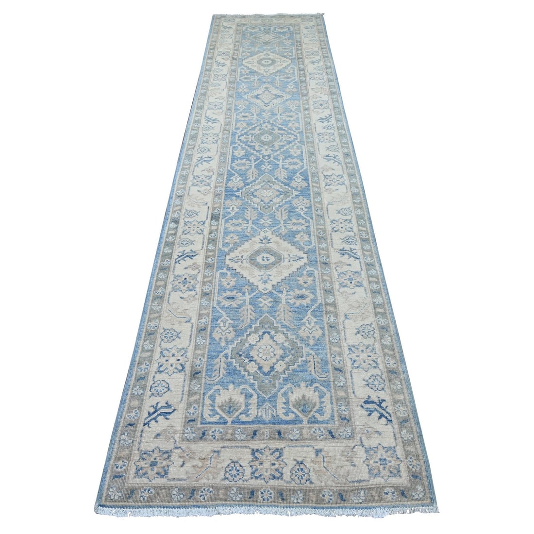3'x12'7" Blue Hand Knotted Vintage Look Kazak Medallions Wool Runner Rug: 3'x12'7" Blue Hand Knotted Vintage Look Kazak Medallions Wool Runner Rug The 3'x12'7" Blue Hand Knotted Vintage Look Kazak Medallions Wool Runner Rug boasts a stunning blue medallion pattern, expertly
