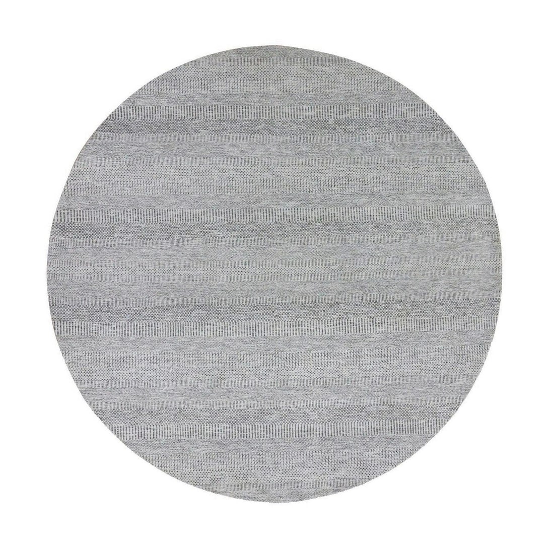 Sea Gray Hand Knotted Round Pure Undyed Wool Grass Design Rug: Sea Gray Hand Knotted Round Pure Undyed Wool Grass Design Rug Woven with traditional techniques, this hand-knotted round rug features an undyed wool grass design in soothing sea gray hues. Made from p