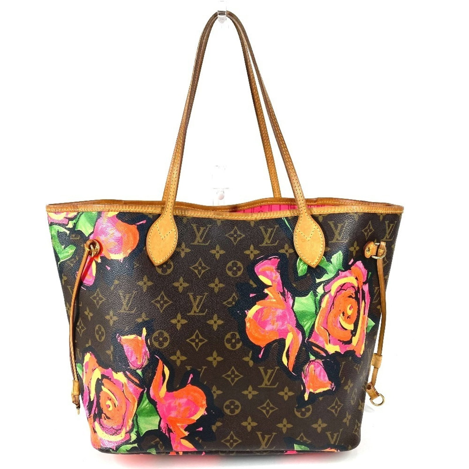 Canvas shoulder bag from Louis Vuitton: Canvas shoulder bag from Louis Vuitton Canvas shoulder bag from Louis Vuitton, featuring high-quality canvas material and a classic design. This stylish tote bag measures 28.5cm x 32cm x 15cm and