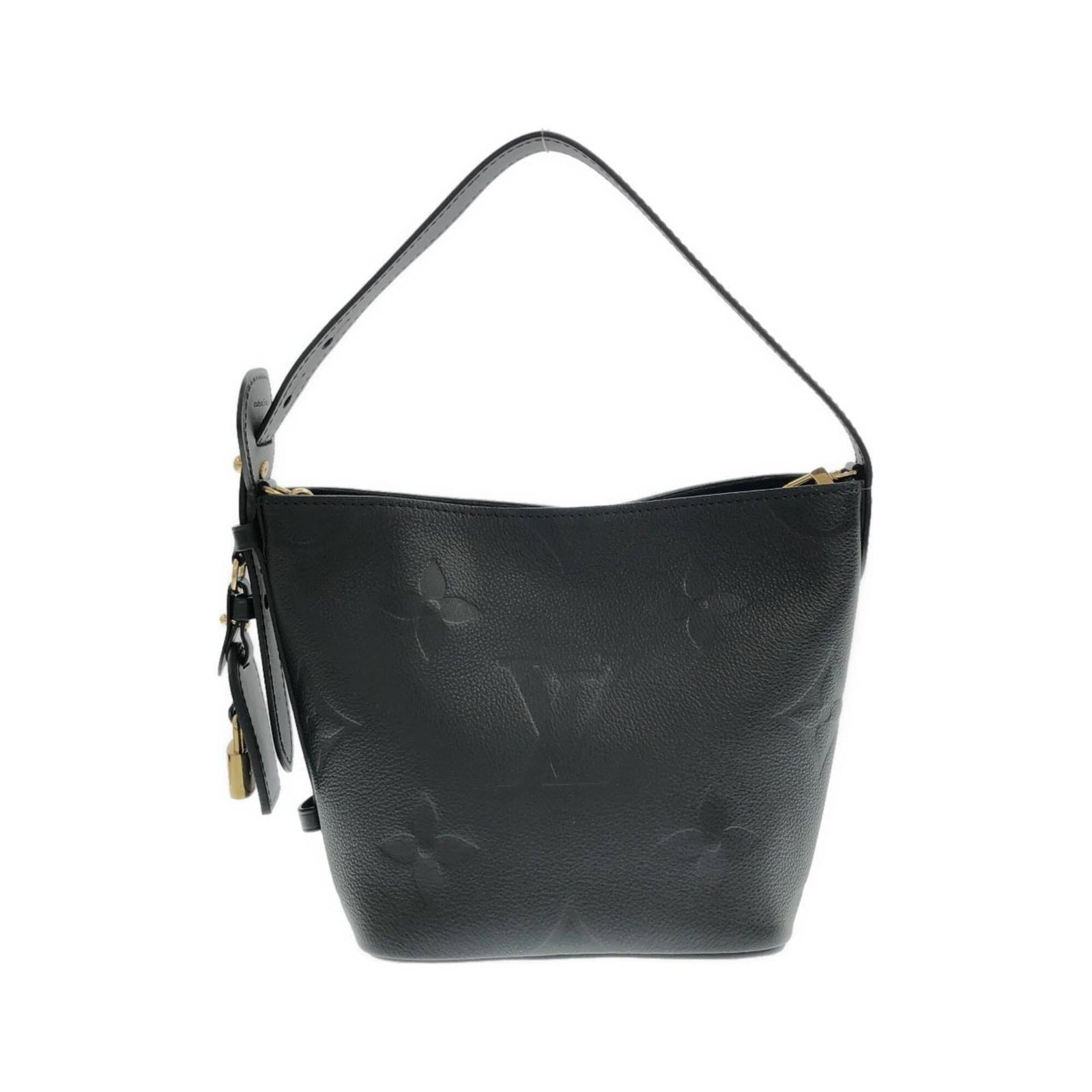 Handbag leather from Louis Vuitton: Handbag leather from Louis Vuitton Black Louis Vuitton handbag made from high-quality leather, measuring 19cm x 18cm x 13cm. The bag's classic design and timeless style make it a versatile accessory