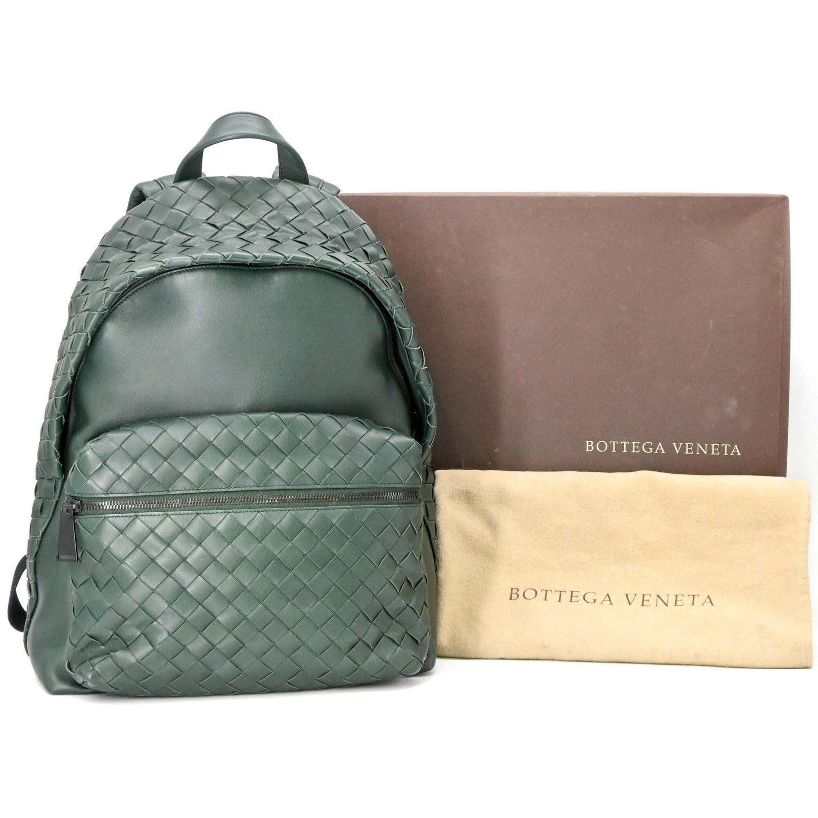 Intrecciato Backpack Bottega: Intrecciato Backpack Bottega Intrecciato woven design adds visual interest to the sleek lines of this Bottega Veneta backpack. The vibrant green color and compact size make it a stylish and practical