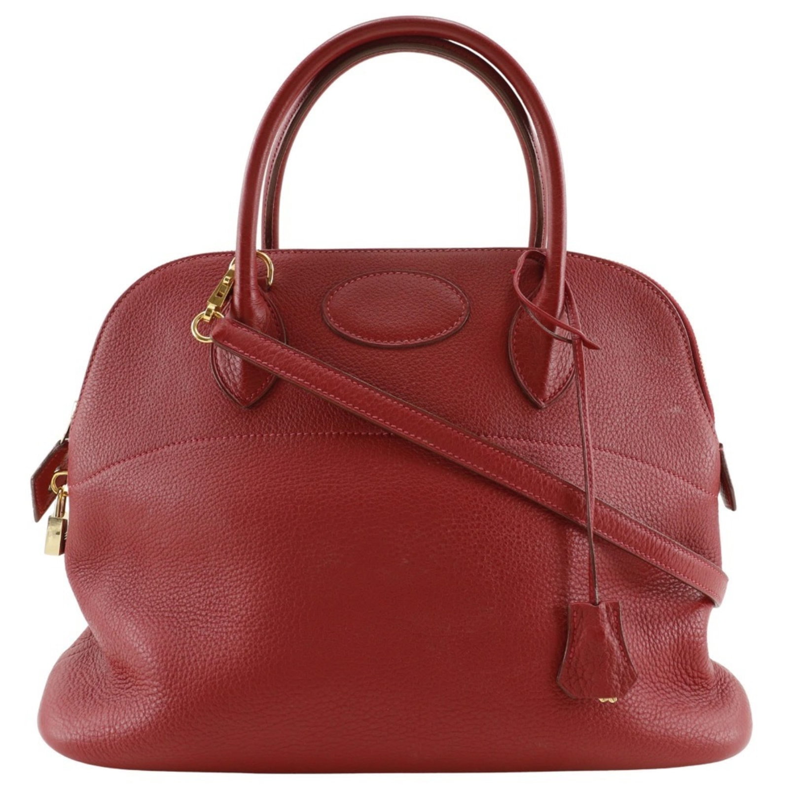 Handbag Taurillon Leather Clemence by Hermes: Handbag Taurillon Leather Clemence by Hermes Taurillon clemence leather gives this Herm?s handbag its distinctive look and feel, with the red color adding a pop of vibrant hue. The bag comes complete