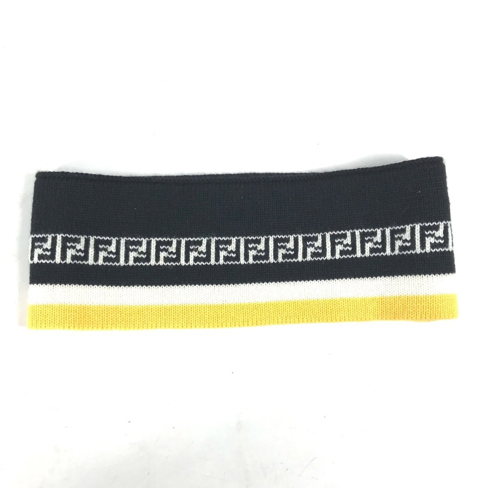 Headband By Fendi: Headband By Fendi The Fendi headband boasts sleek black and white design, accented with vibrant yellow hues. Measuring 8.5cm x 24.5cm, it offers a stylish and compact accessory for everyday wear. Its 
