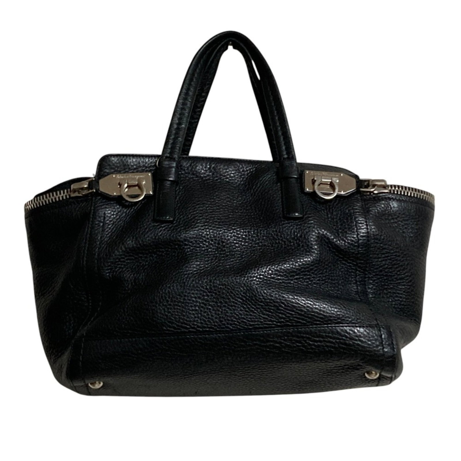 Salvatore Ferragamo Handbag: Salvatore Ferragamo Handbag Black Salvatore Ferragamo Handbag, measuring 19.5cm x 36.5cm x 15cm, features a sleek and sophisticated design with a signature that bears the mark of the renowned Italian