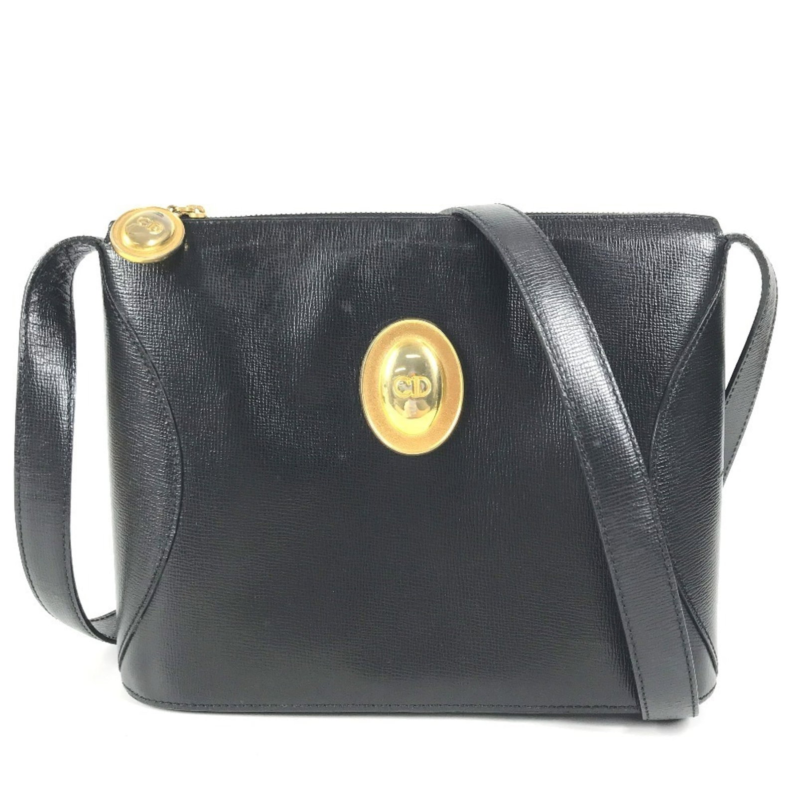 Christian Dior Pochette Leather Bag Shoulder: Christian Dior Pochette Leather Bag Shoulder The Christian Dior Pochette Leather Bag Shoulder boasts sleek, sophisticated design with its black leather exterior. Measuring 18.5cm x 24cm x 7cm, it