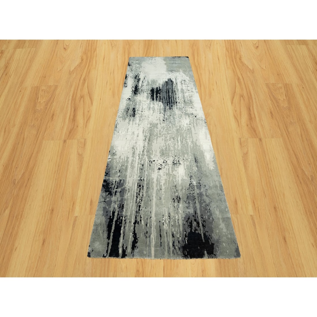 4'2x12' Iridium Black Hand Knotted Abstract Wool and Silk Wide Runner Rug: 4'2x12' Iridium Black Hand Knotted Abstract Wool and Silk Wide Runner Rug The Iridium Black Hand Knotted Abstract Wool and Silk Wide Runner Rug boasts an all-black, flatweave design with subtle nuance