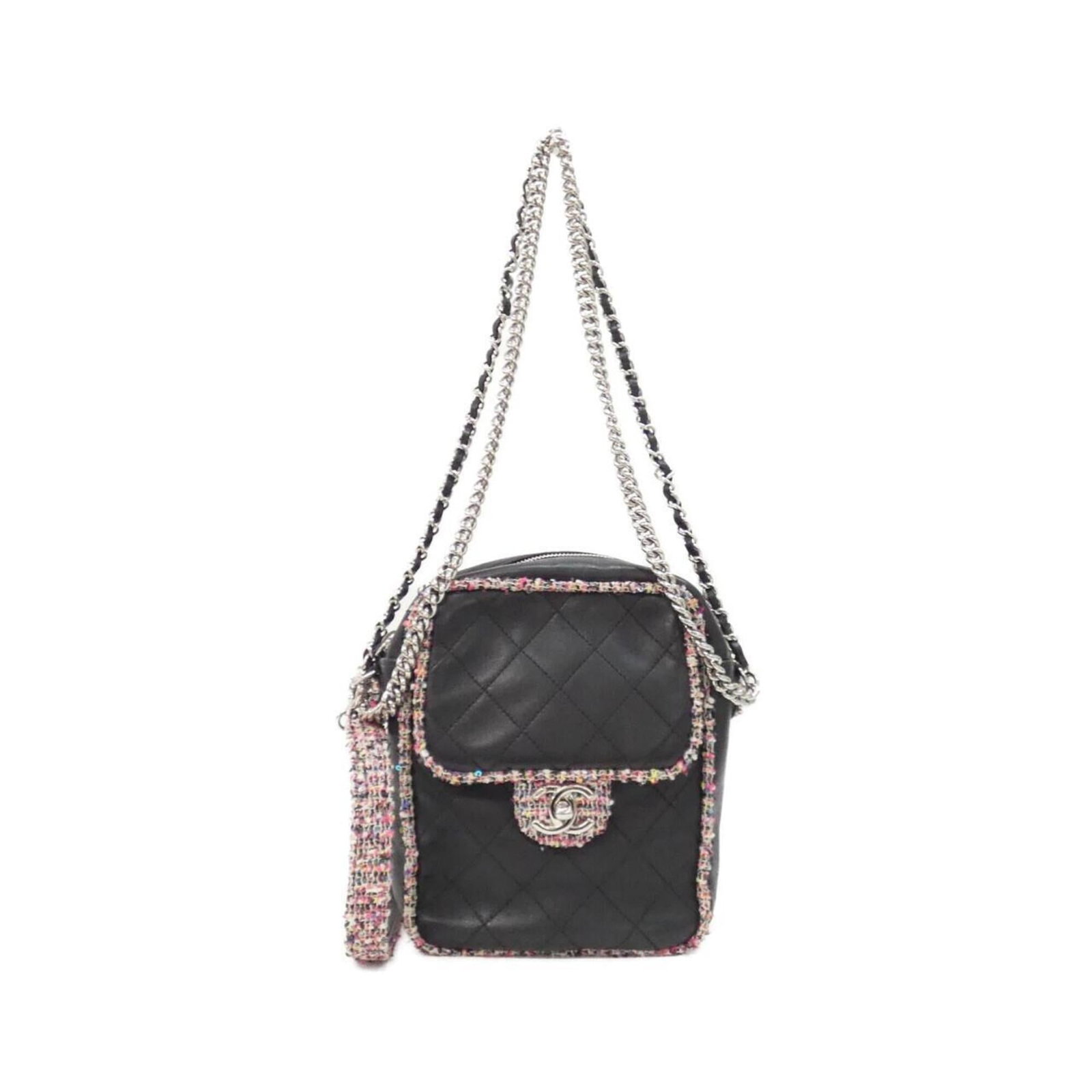 Shoulder Bag Tweed Leather by Chanel: Shoulder Bag Tweed Leather by Chanel Tweed and leather come together in a sleek, multi-colored design from Chanel. This black shoulder bag features silver hardware and measures 21cm x 16cm x 6cm. The