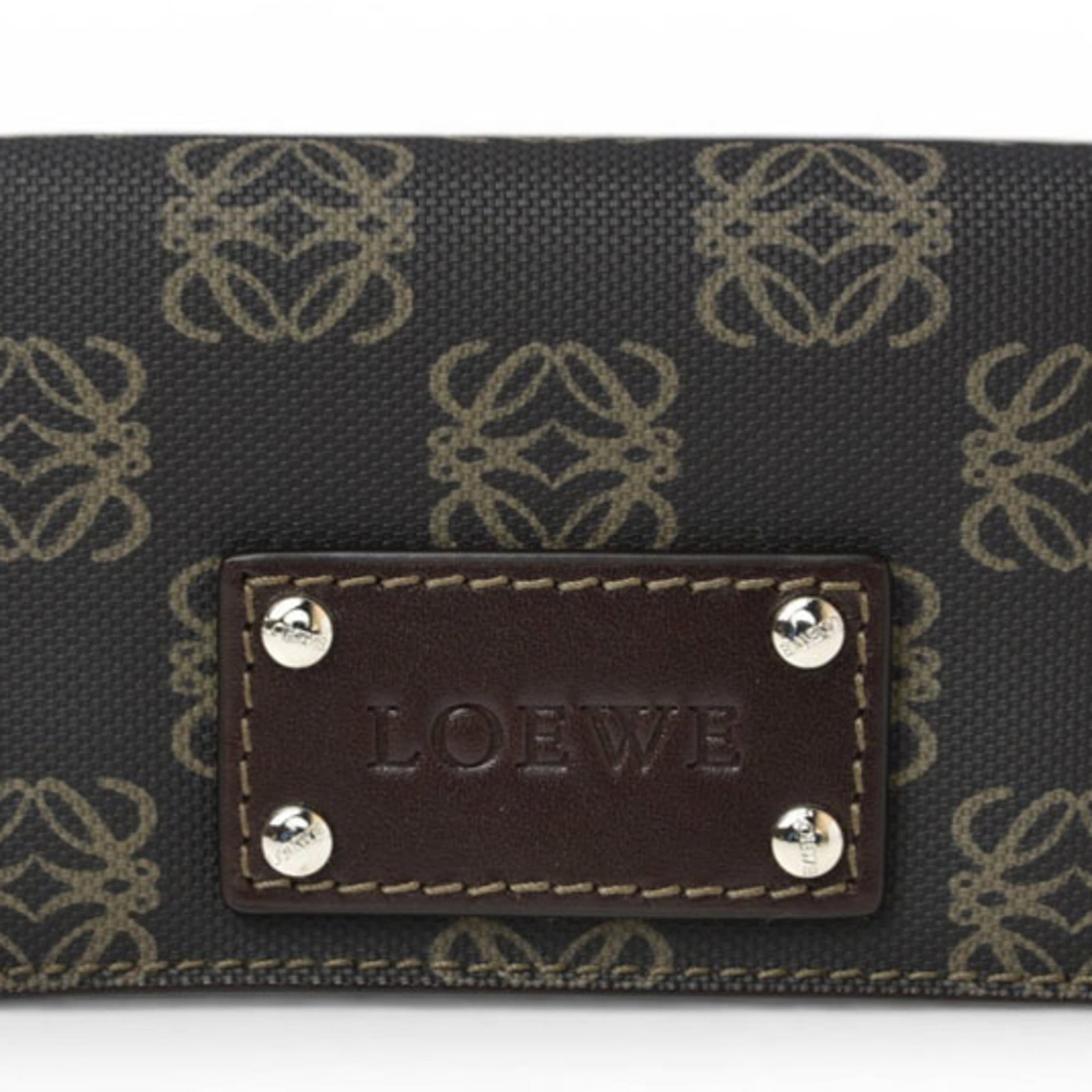 Coin purse coated canvas by Loewe Coin: Coin purse coated canvas by Loewe Coin Coated canvas coin purse by Loewe, featuring a sturdy and stylish design. This brown-colored accessory measures 7.3cm x 10.7cm x 1.5cm, making it a compact and c