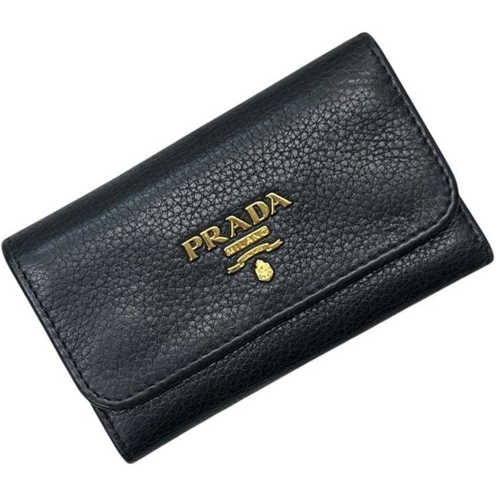 Prada Keycase Leather: Prada Keycase Leather The Prada Keycase Leather is a sleek and sophisticated accessory, measuring 6.7cm x 10.7cm x 1.8cm in size, with a classic black Nero color. Made from high-quality leather, this