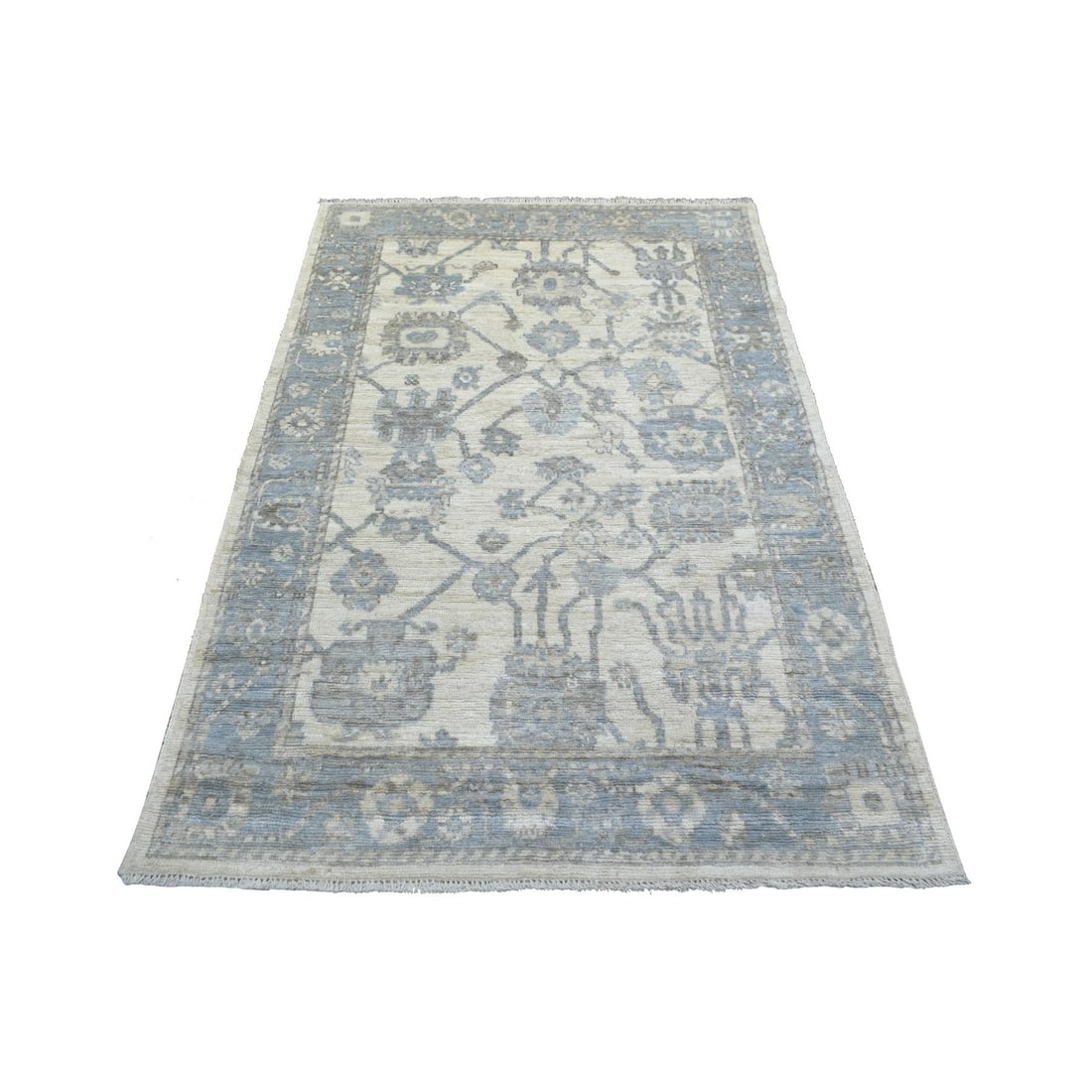 4'1"x6'1" Ivory Angora Oushak Soft Leaf Design Hand Knotted Wool Rug: 4'1"x6'1" Ivory Angora Oushak Soft Leaf Design Hand Knotted Wool Rug The 4'1"x6'1" Ivory Angora Oushak Soft Leaf Design Hand Knotted Wool Rug boasts a stunning ivory hue and intricate soft leaf