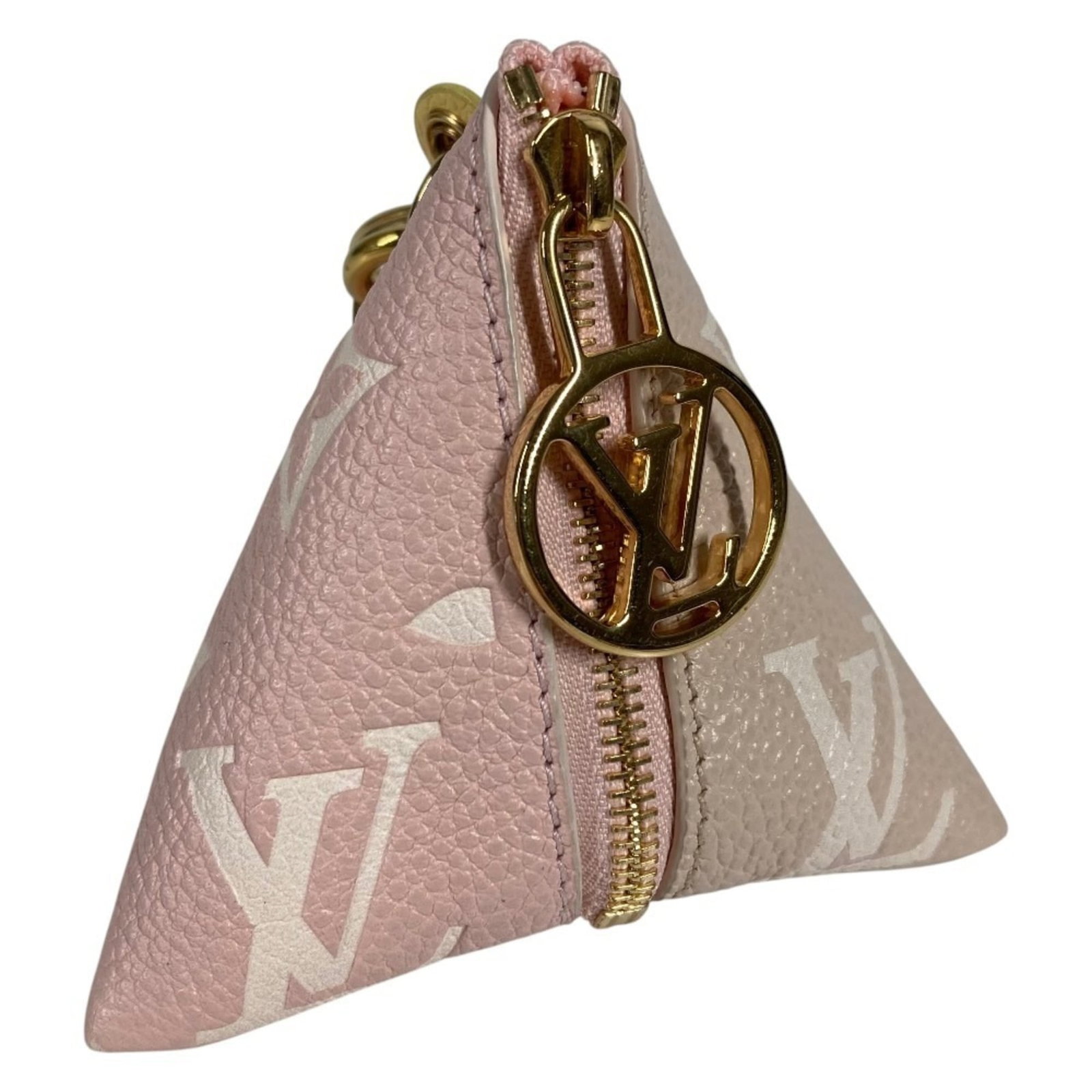 Leather Louis Vuitton Keyring: Leather Louis Vuitton Keyring Pink leather keyring from Louis Vuitton, made in Italy. The iconic brand's signature style is evident in the high-quality leather material and classic design. A stylish a