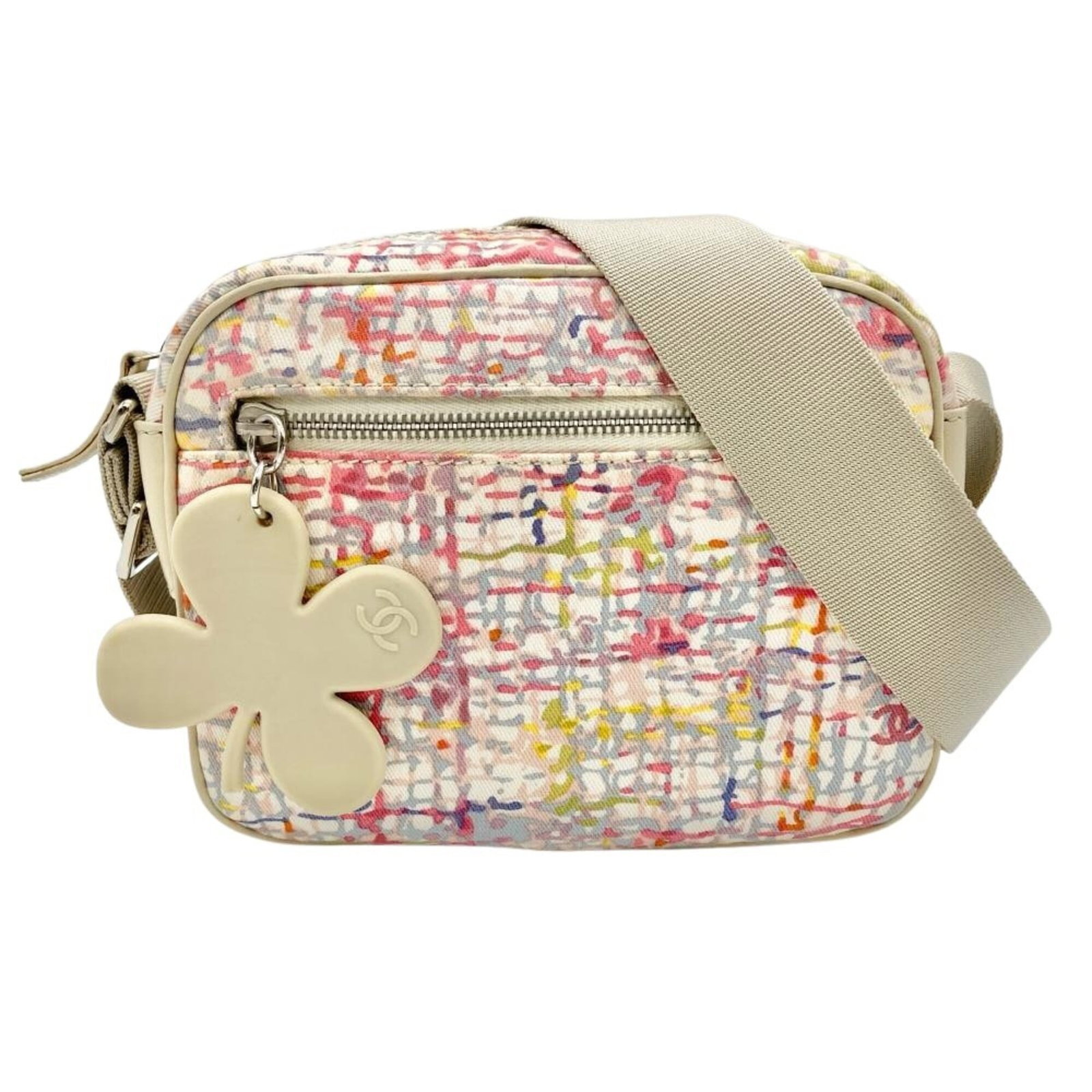 Shoulder Bag Canvas From: Shoulder Bag Canvas From Canvas shoulder bag from Chanel, made in Italy with a unique beige and multi-color design. Measuring just 15cm x 19cm x 6cm, this stylish bag features a canvas material and co