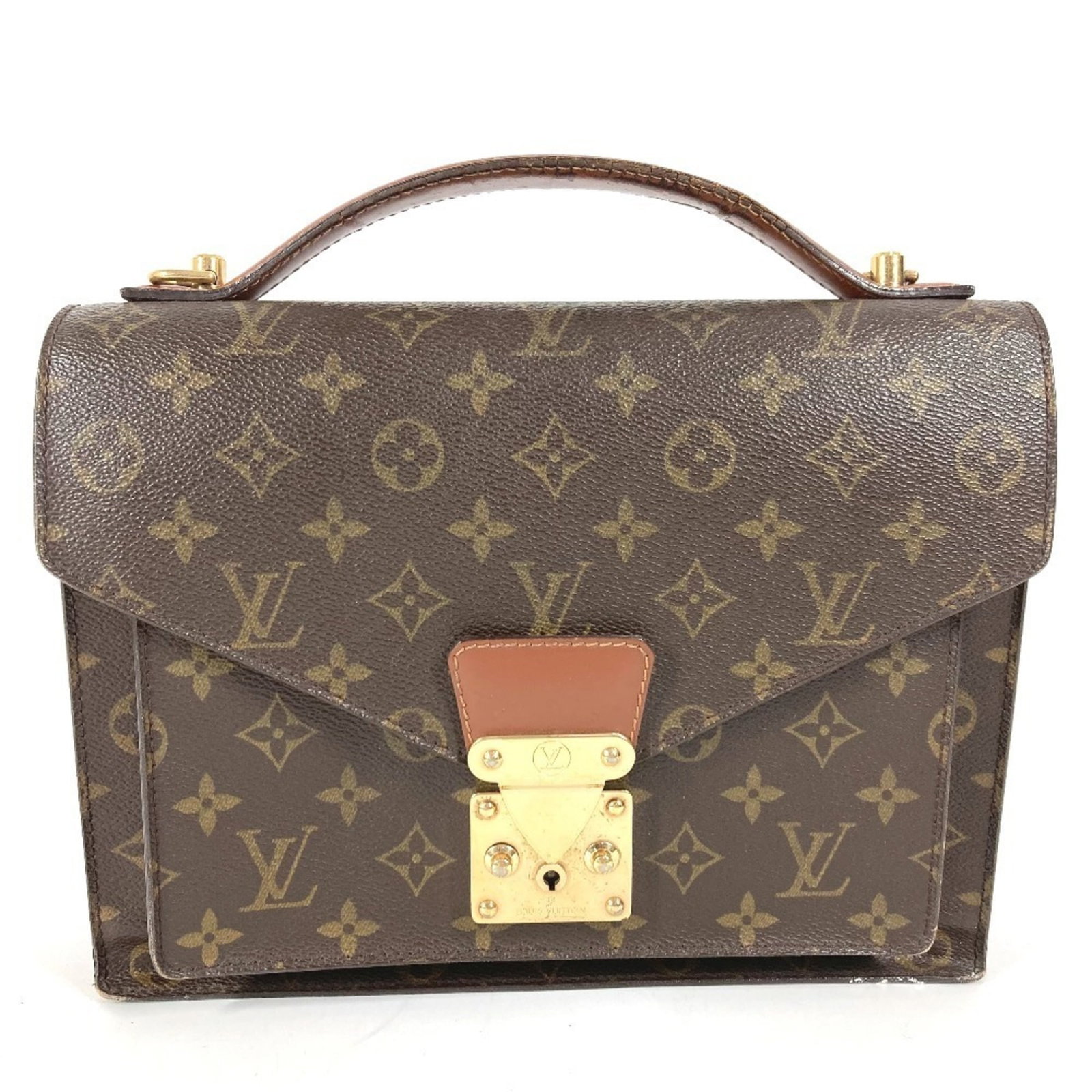 Canvas Handbag Monogram Louis Vuitton: Canvas Handbag Monogram Louis Vuitton Canvas Handbag Monogram Louis Vuitton - A classic brown canvas handbag featuring the iconic Louis Vuitton monogram, crafted with a timeless design that exudes