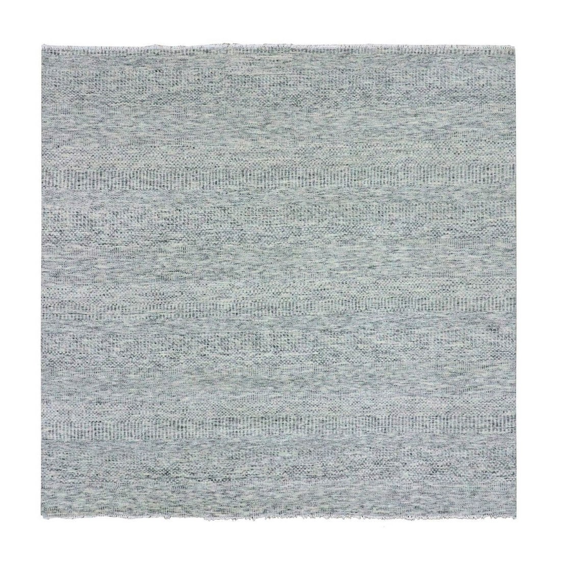 8'x8' Silver Gray Undyed Wool Grass Design Hand Knotted Square Rug: 8'x8' Silver Gray Undyed Wool Grass Design Hand Knotted Square Rug The Silver Gray Undyed Wool Grass Design Hand Knotted Square Rug boasts an elegant, understated beauty with its subtle grey tone and