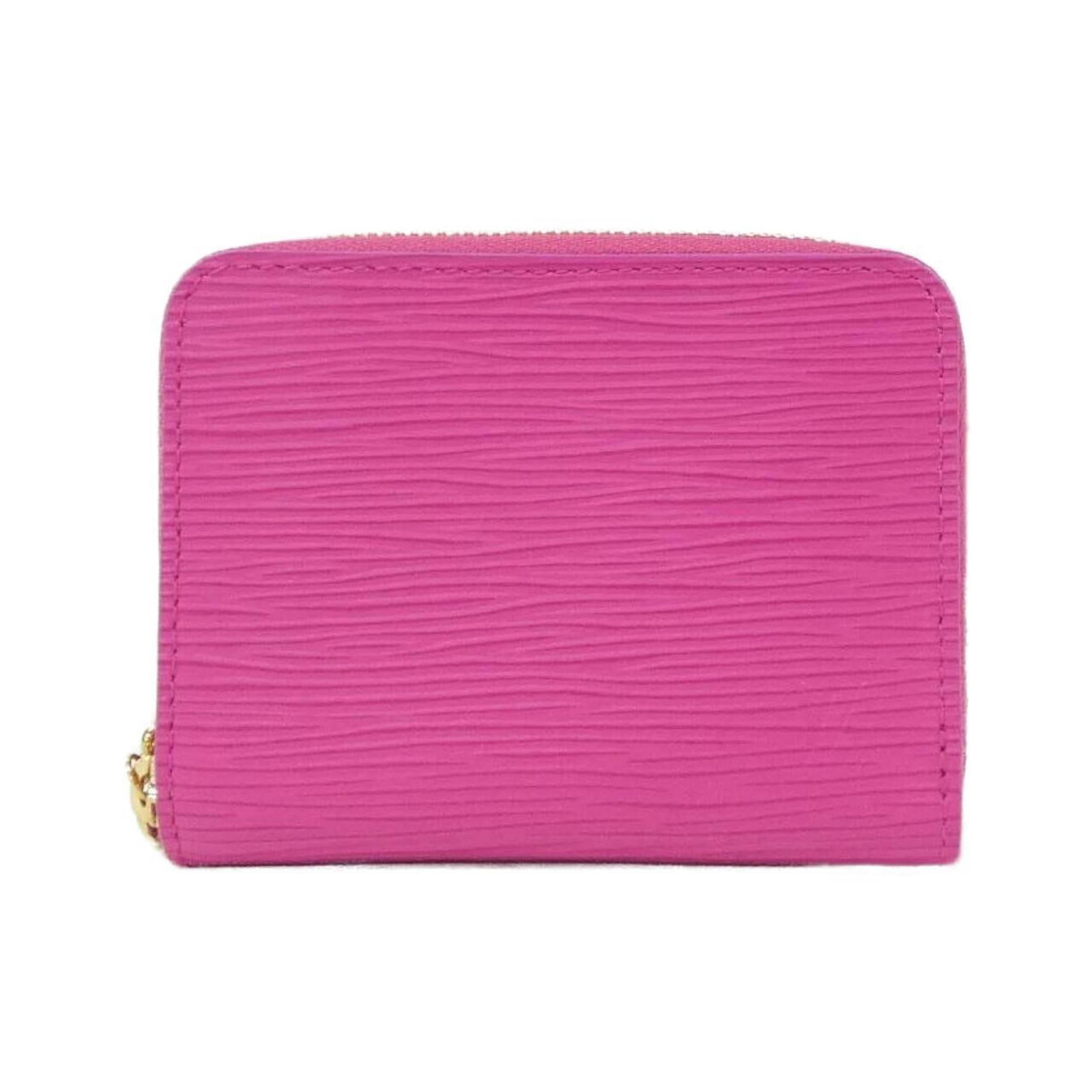 Leather case coin purse Louis Vuitton: Leather case coin purse Louis Vuitton The Louis Vuitton MPN M14144 leather case coin purse boasts a chic pink color and elegant design, featuring high-quality calfskin material. Its compact size