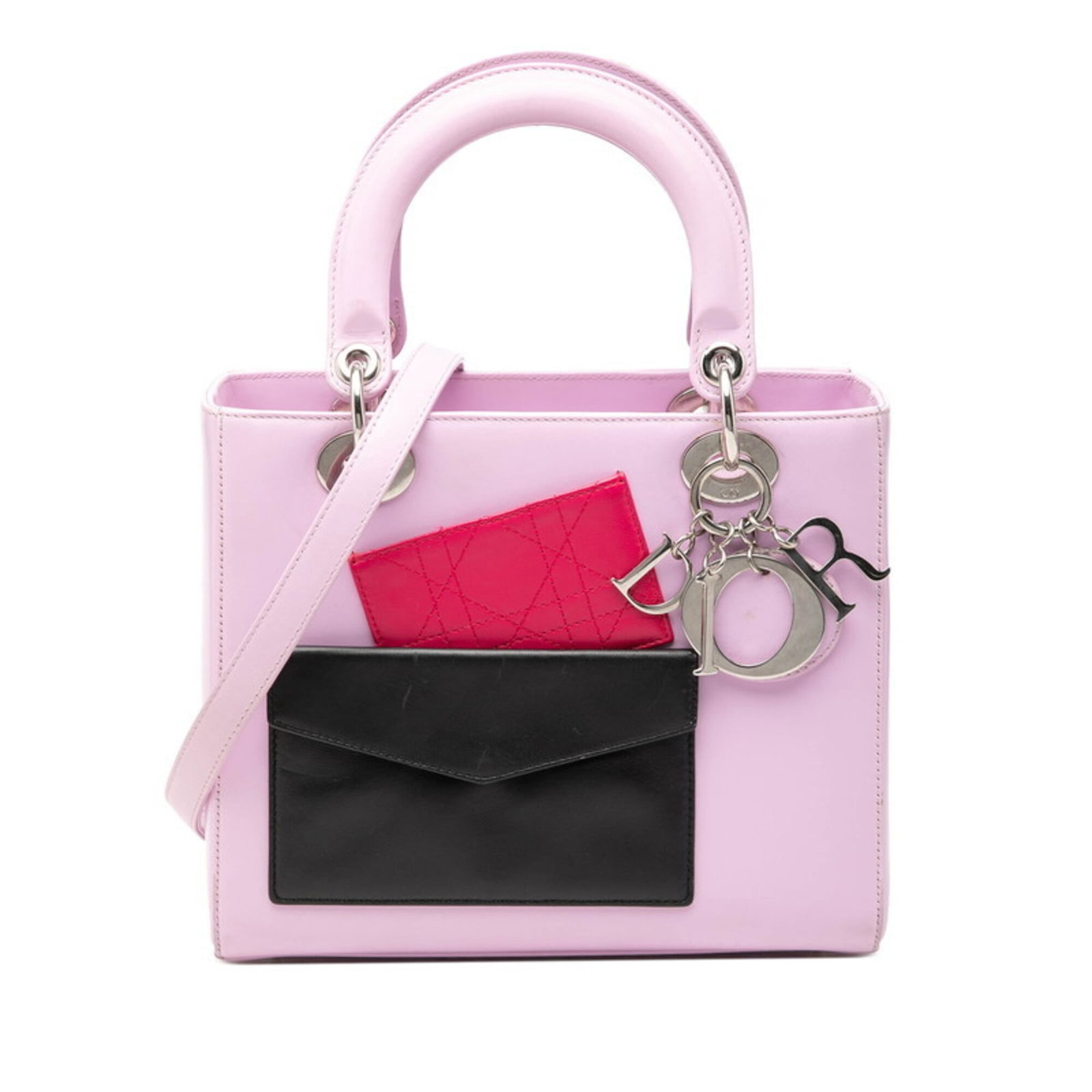Christian Dior Leather Shoulder Bag: Christian Dior Leather Shoulder Bag Christian Dior Leather Shoulder Bag. This vibrant, multi-color leather shoulder bag boasts a unique design with dimensions of 20cm x 23.5cm x 11.5cm. Its striking p