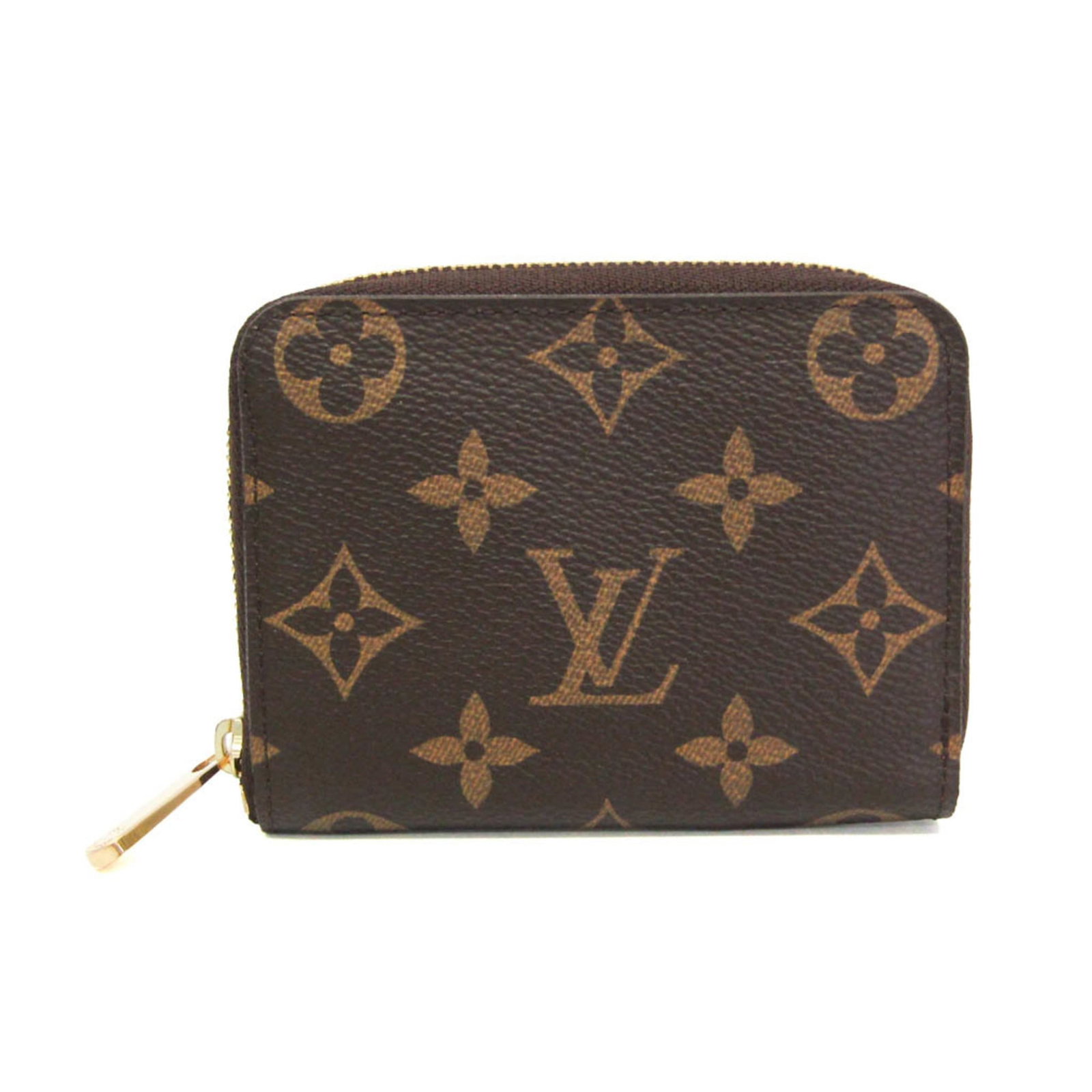 Louis Vuitton Coin Purse/ Coin Case Monogram: Louis Vuitton Coin Purse/ Coin Case Monogram Monogrammed with iconic Louis Vuitton style, this Zippy Coin Purse features a timeless design and practical details. With two card slots and multiple coin 