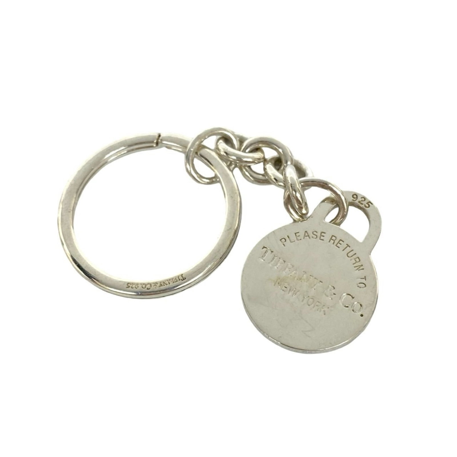 Tiffany silver keyring 925: Tiffany silver keyring 925 Silver Tiffany keyring, made from high-quality 925 sterling silver. This elegant accessory features a sleek design and a subtle shine that adds a touch of sophistication to 