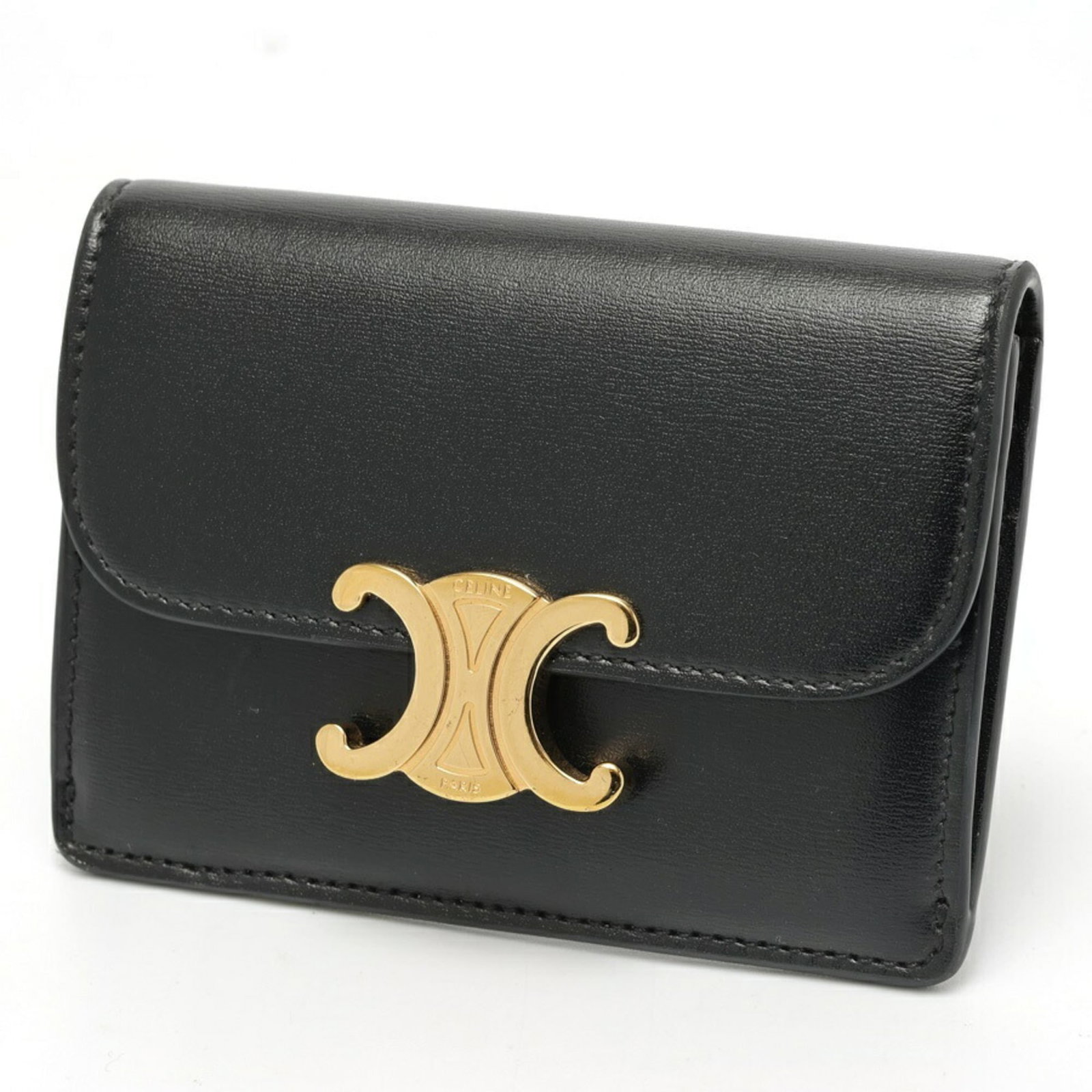 Celine Coin Purse/ Coin Case Leather: Celine Coin Purse/ Coin Case Leather This sleek black leather coin purse features a classic design with clean lines and minimal embellishments. Made from high-quality Italian leather, it measures