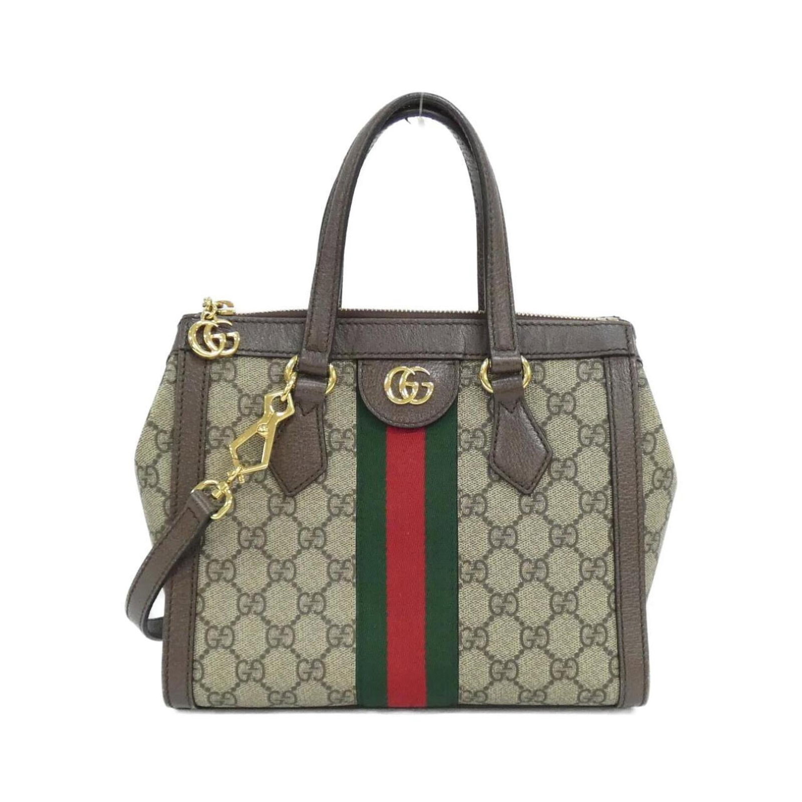 Gucci supreme leather canvas handbag: Gucci supreme leather canvas handbag Gucci Supreme Leather Canvas Handbag in Beige and Brown Features GG Supreme, canvas, and leather materials, with a shoulder strap accessory. This handbag measures